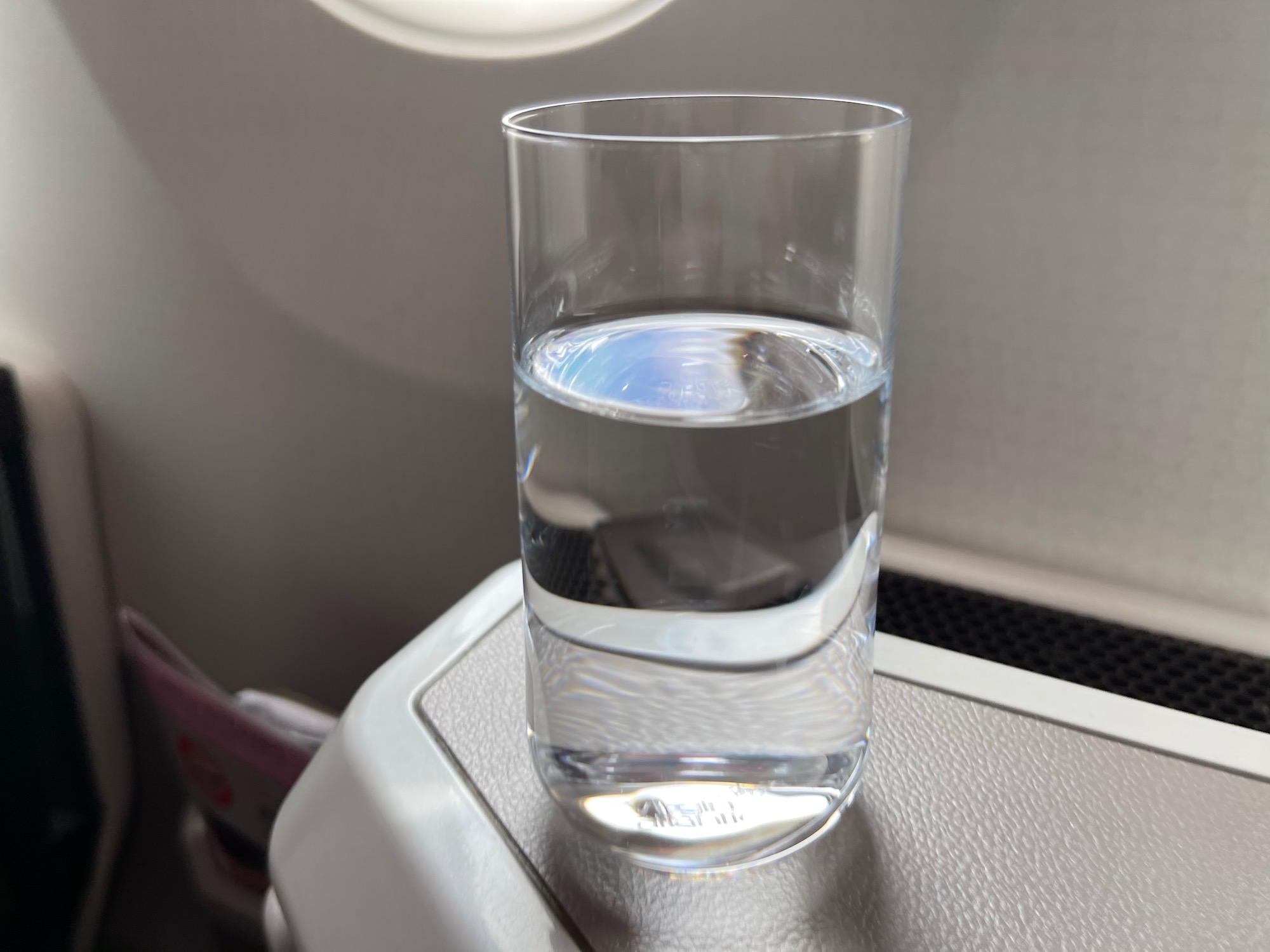 a glass of water on a table