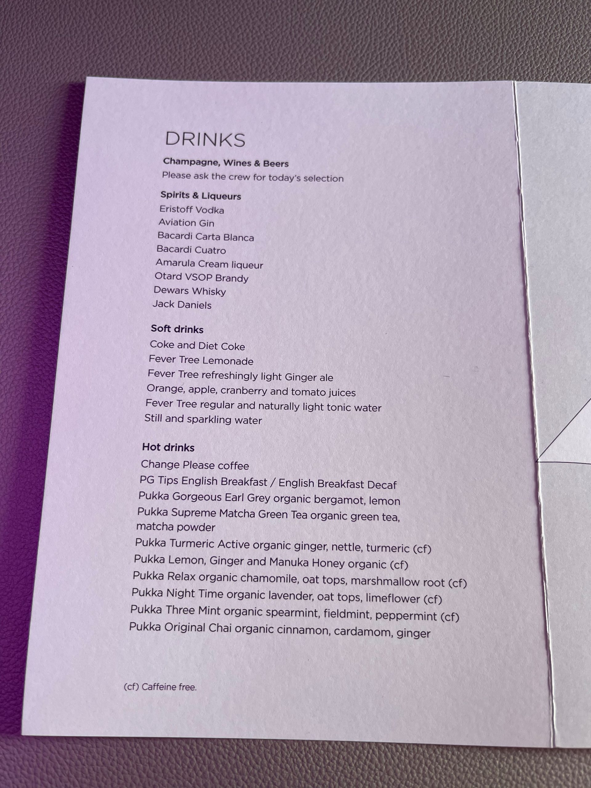 a menu on a purple surface