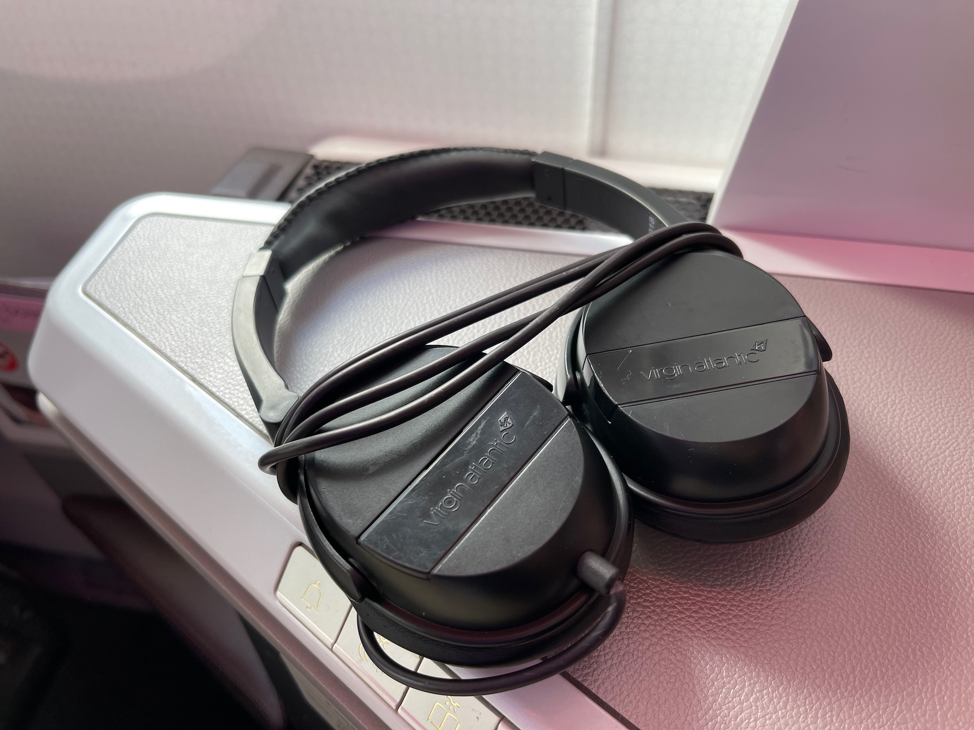 a pair of headphones on a silver surface