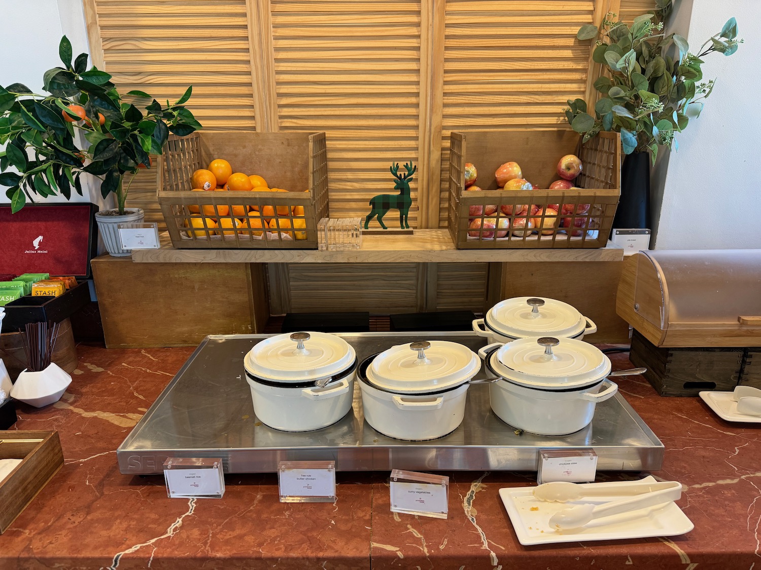 a group of white pots on a counter