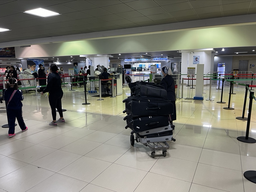 a group of people in a terminal