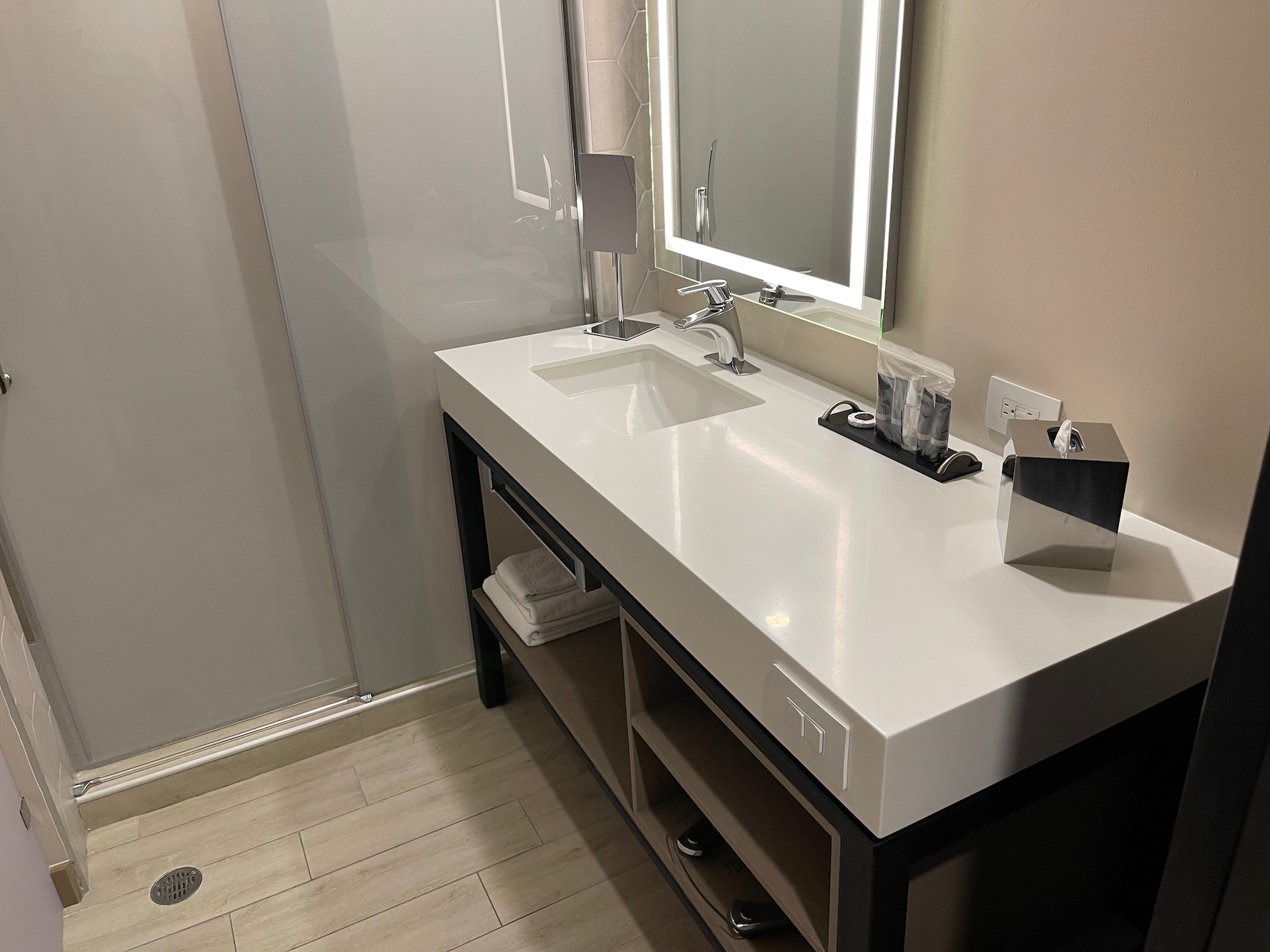 a bathroom with a mirror and sink