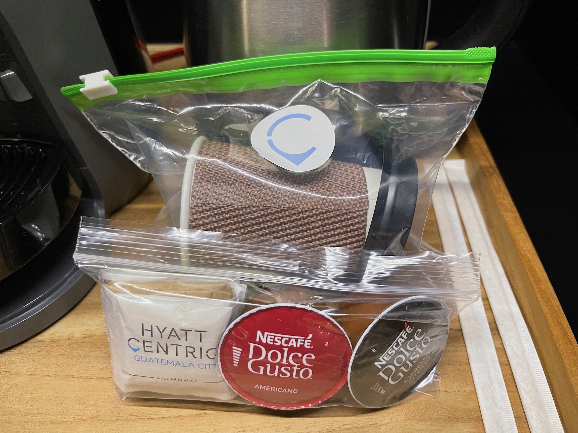 a bag of coffee cups and other items