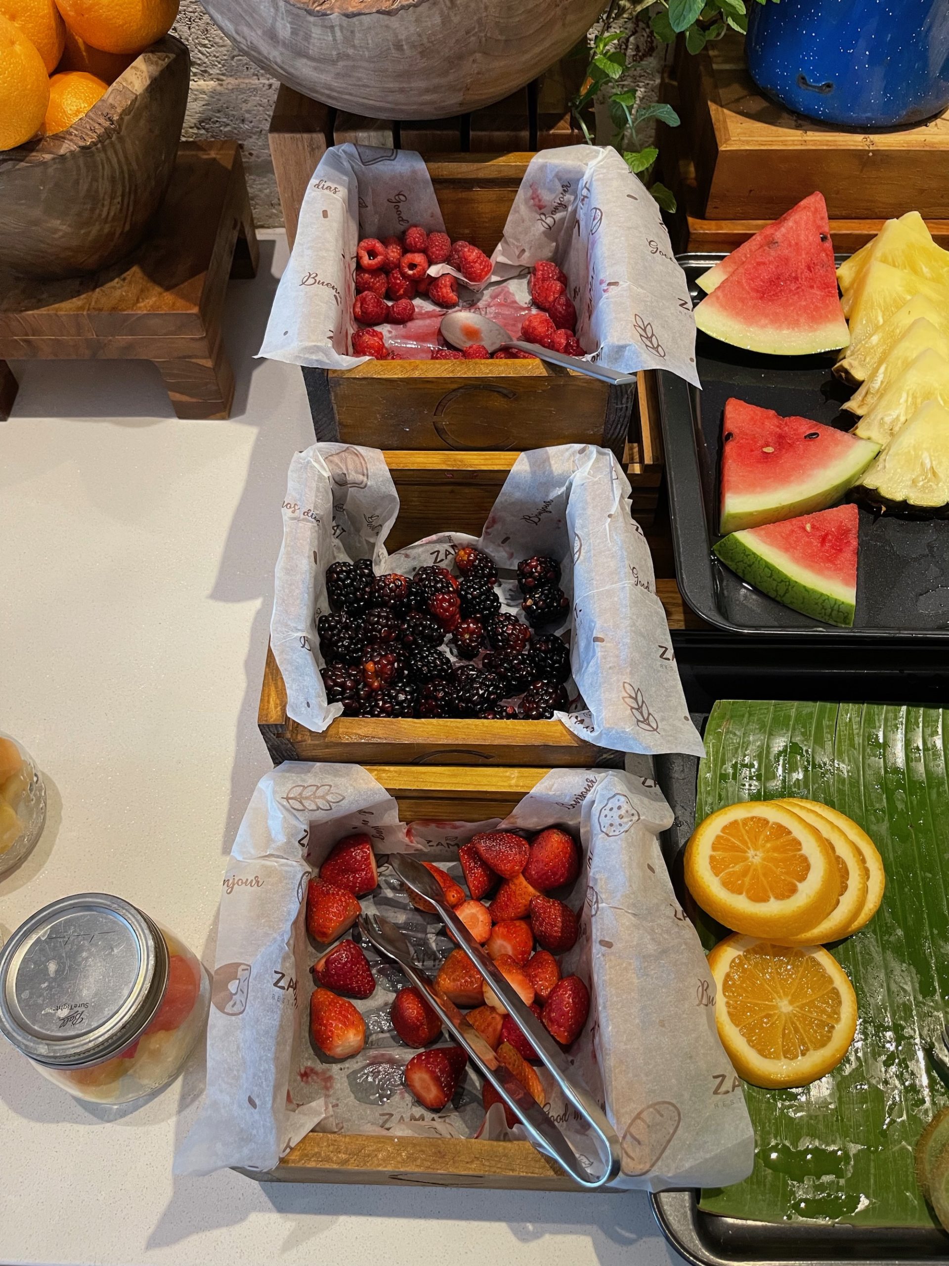 fruit in wooden boxes with fruit in them
