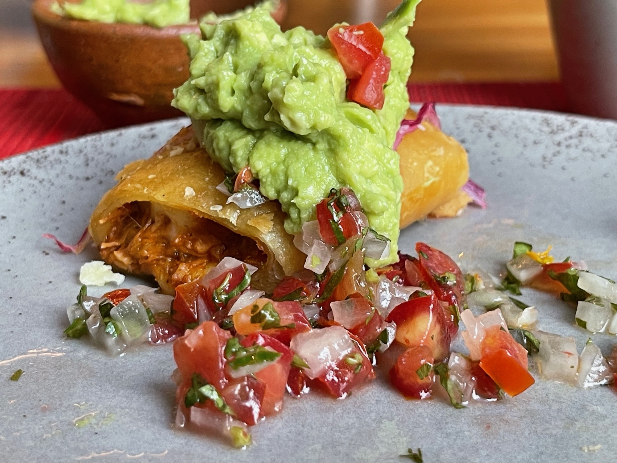 a plate of food with salsa