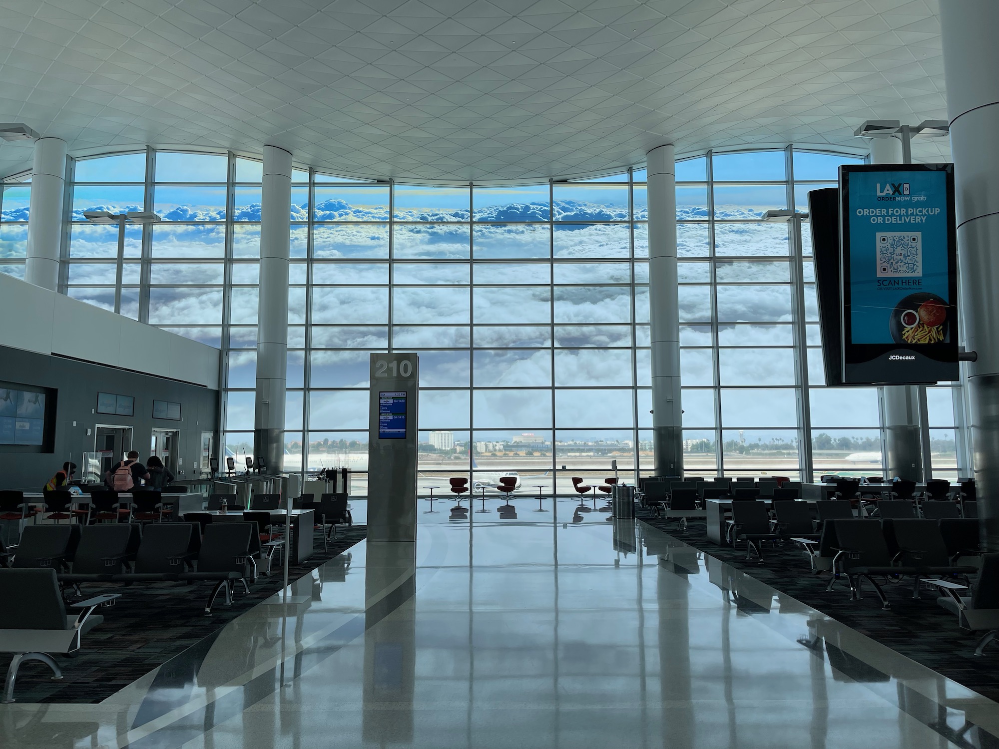 a large glass window in an airport