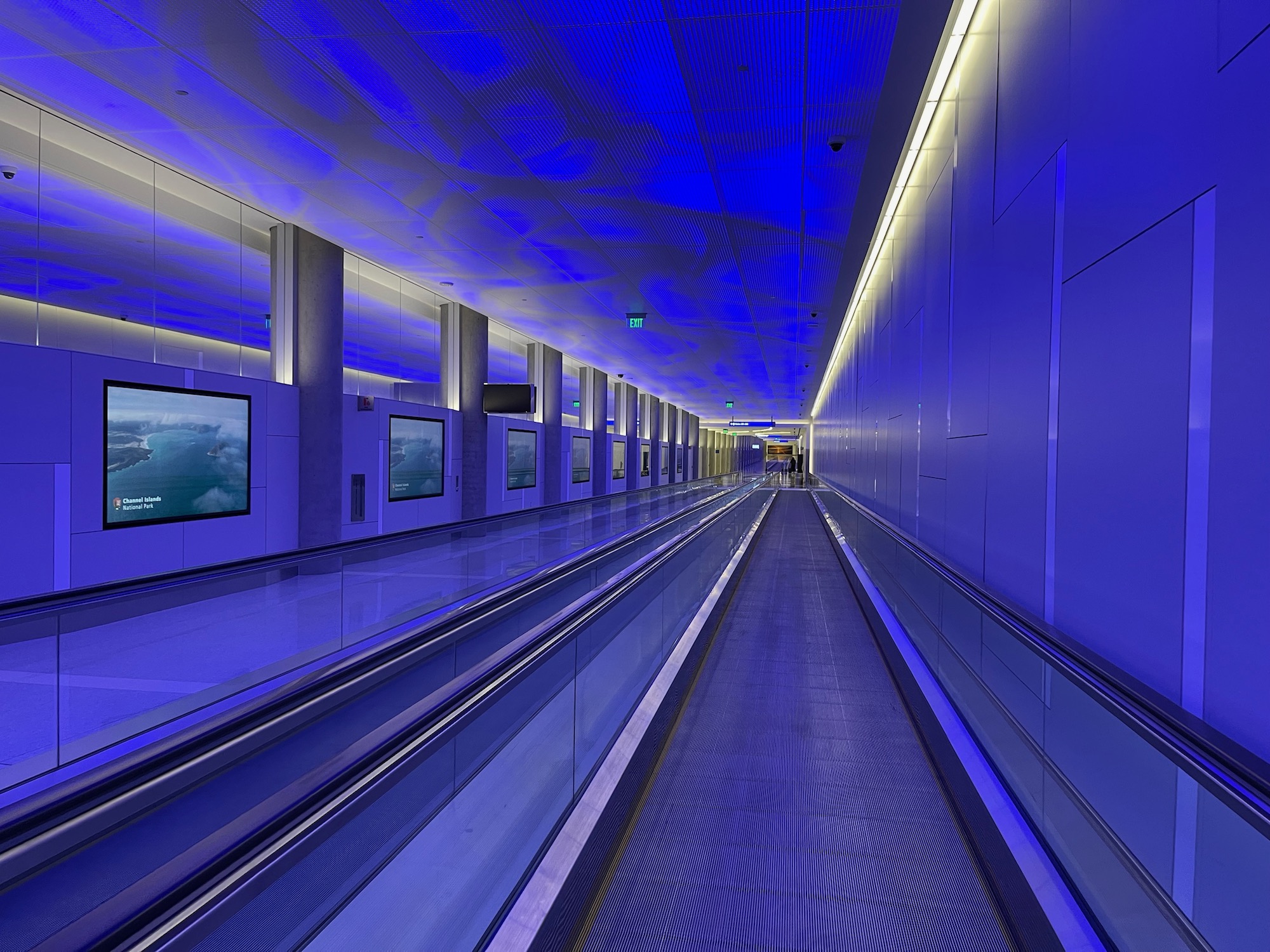 a blue hallway with a blue ceiling