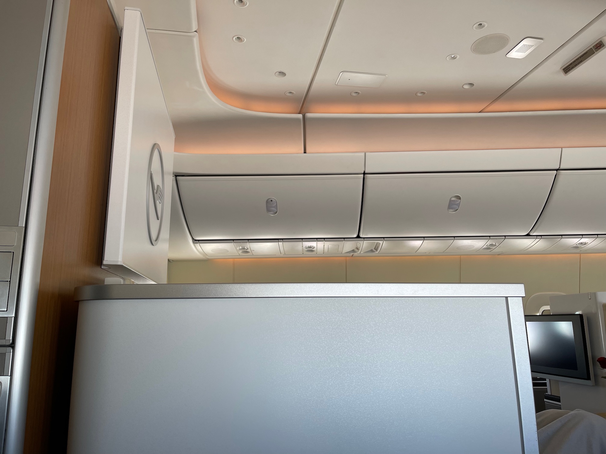 a white cabinet in a plane