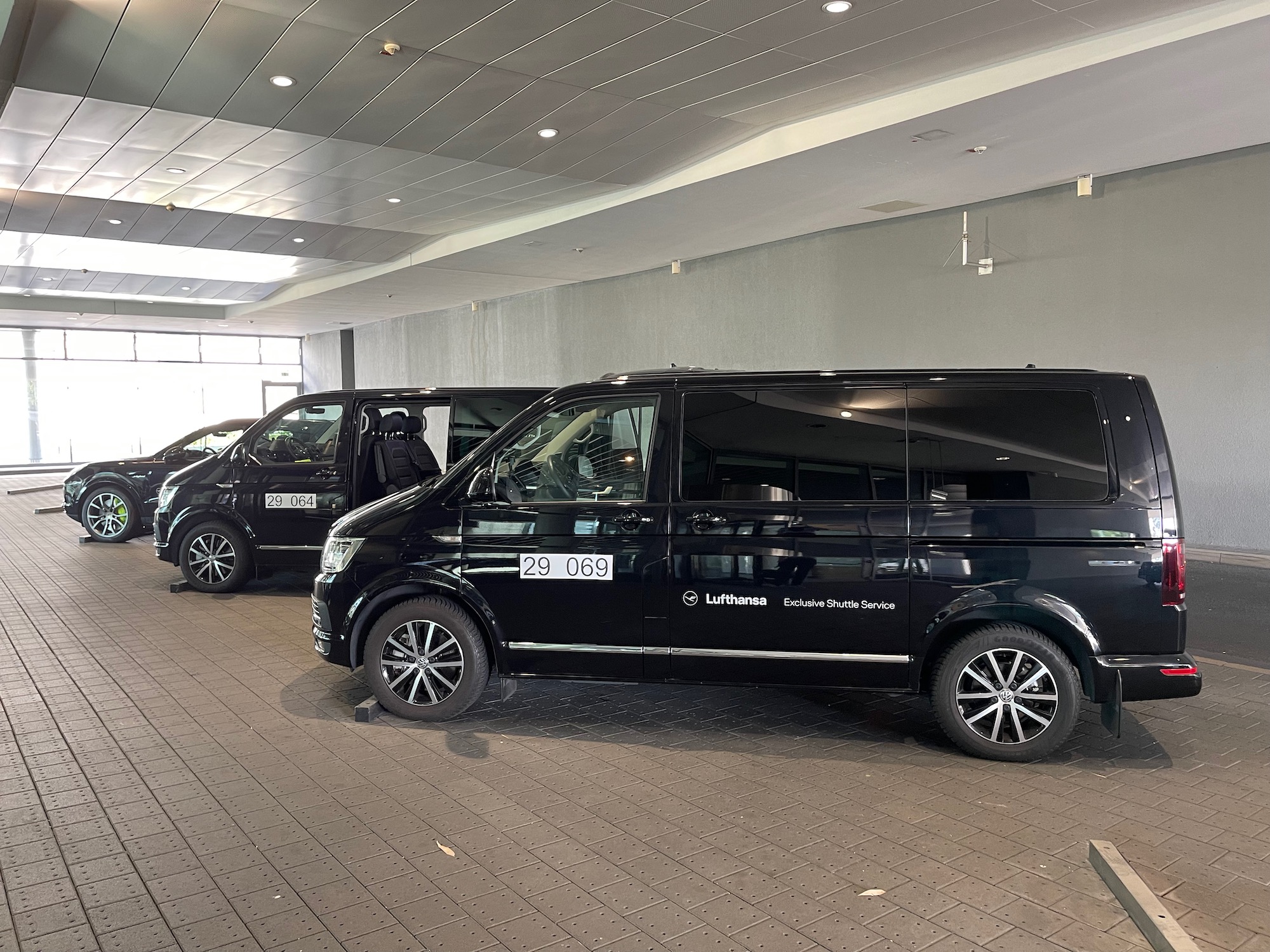 a group of black vans in a room