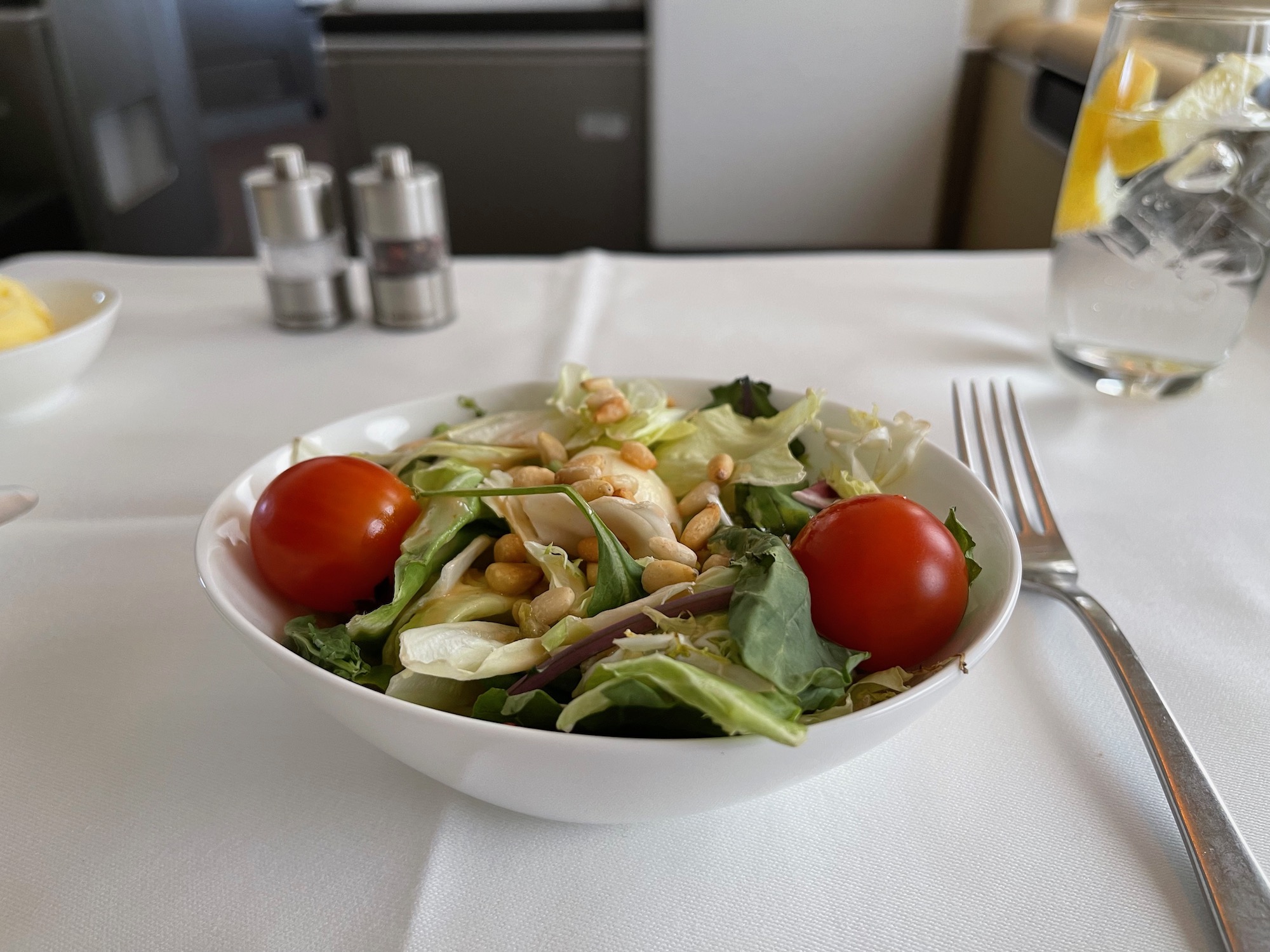 a bowl of salad on a table