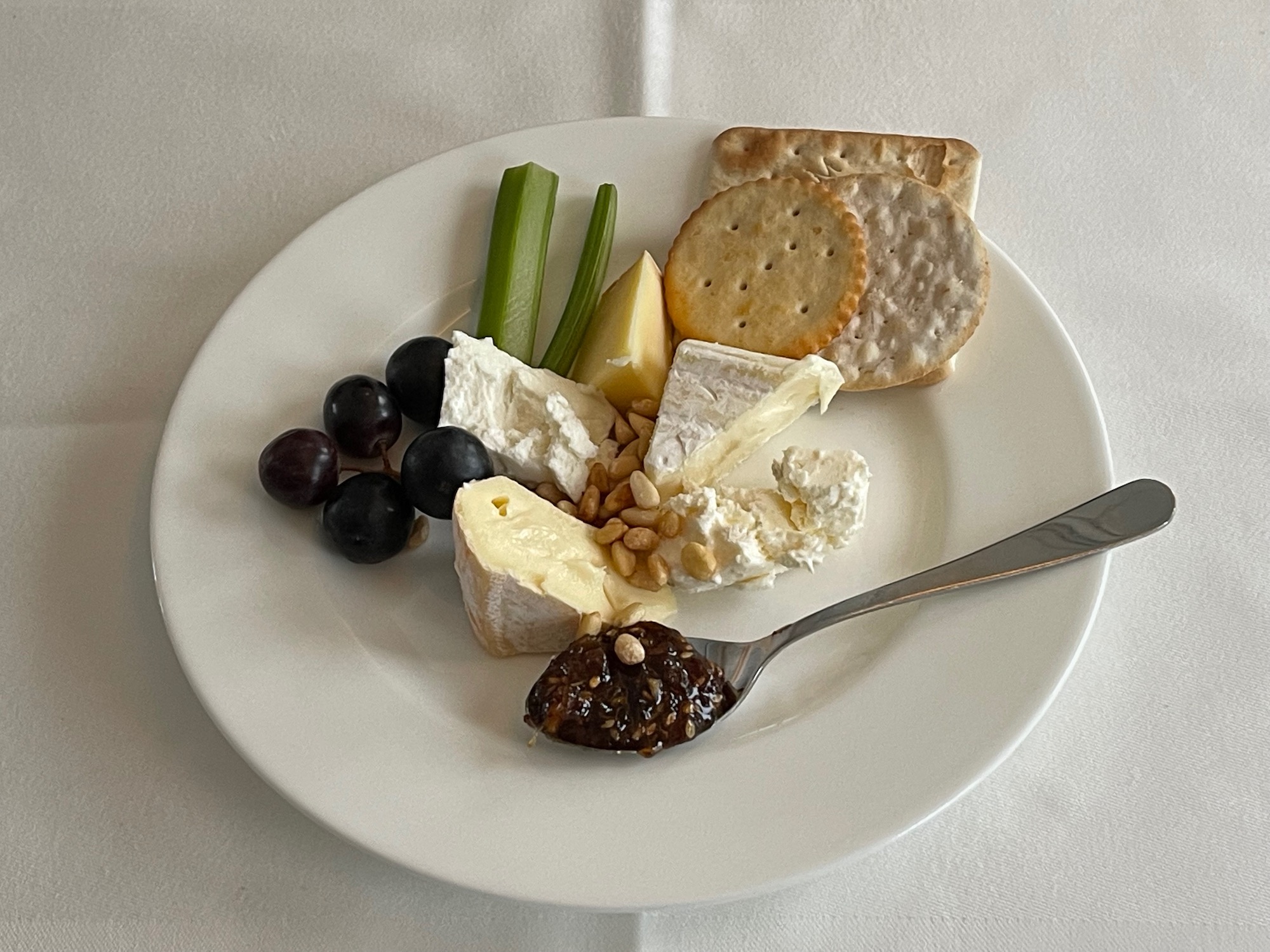 a plate of food with a spoon