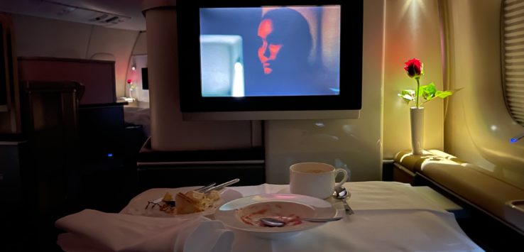 a tv on a table in an airplane