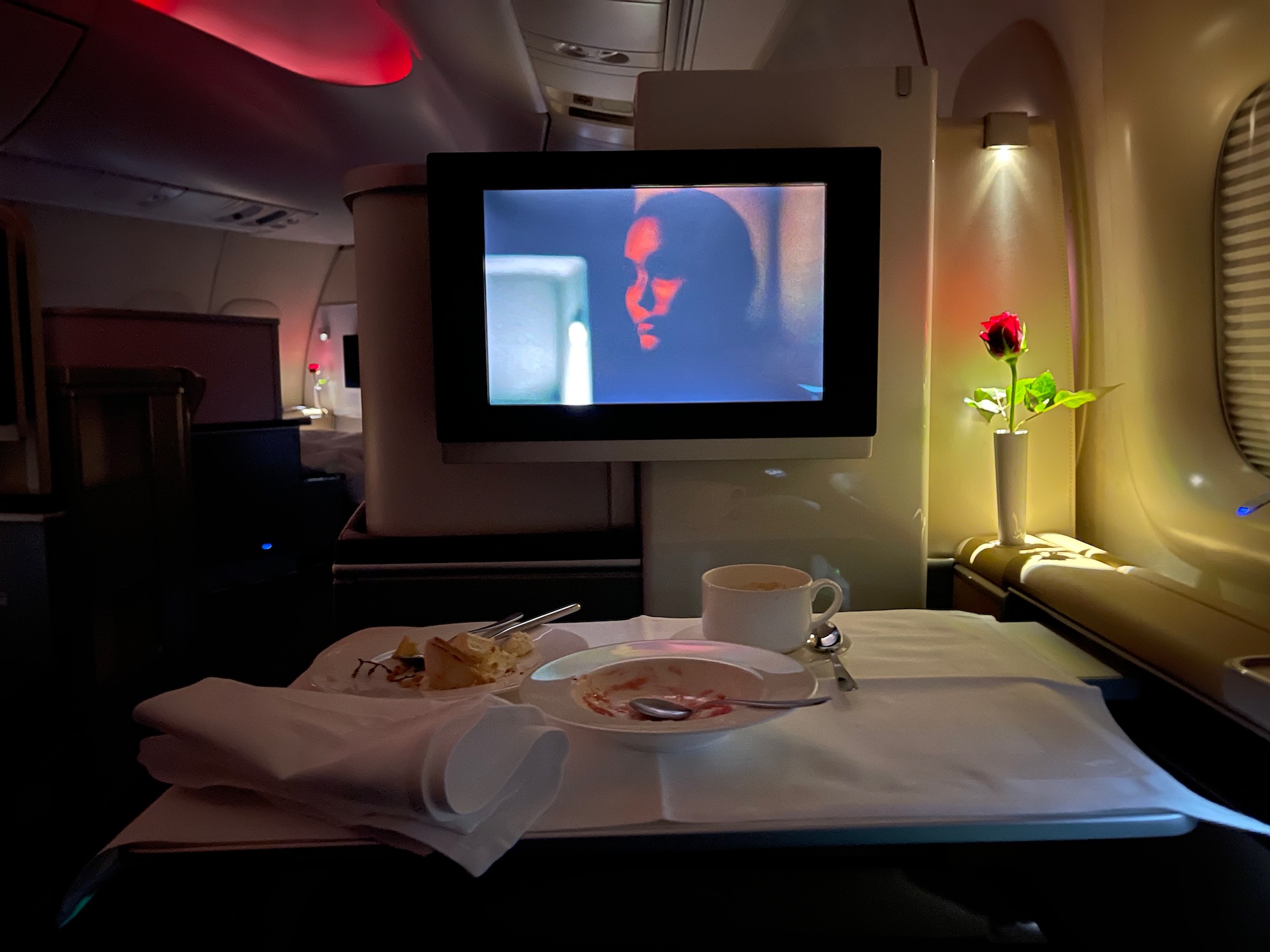 a tv on a table in an airplane