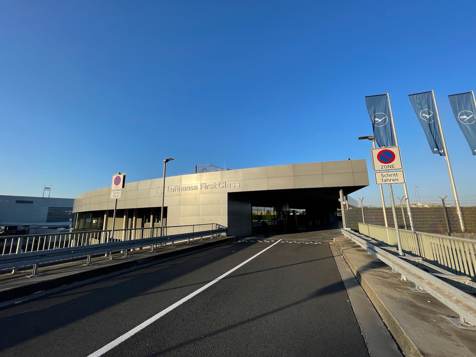 a building with a bridge and a road