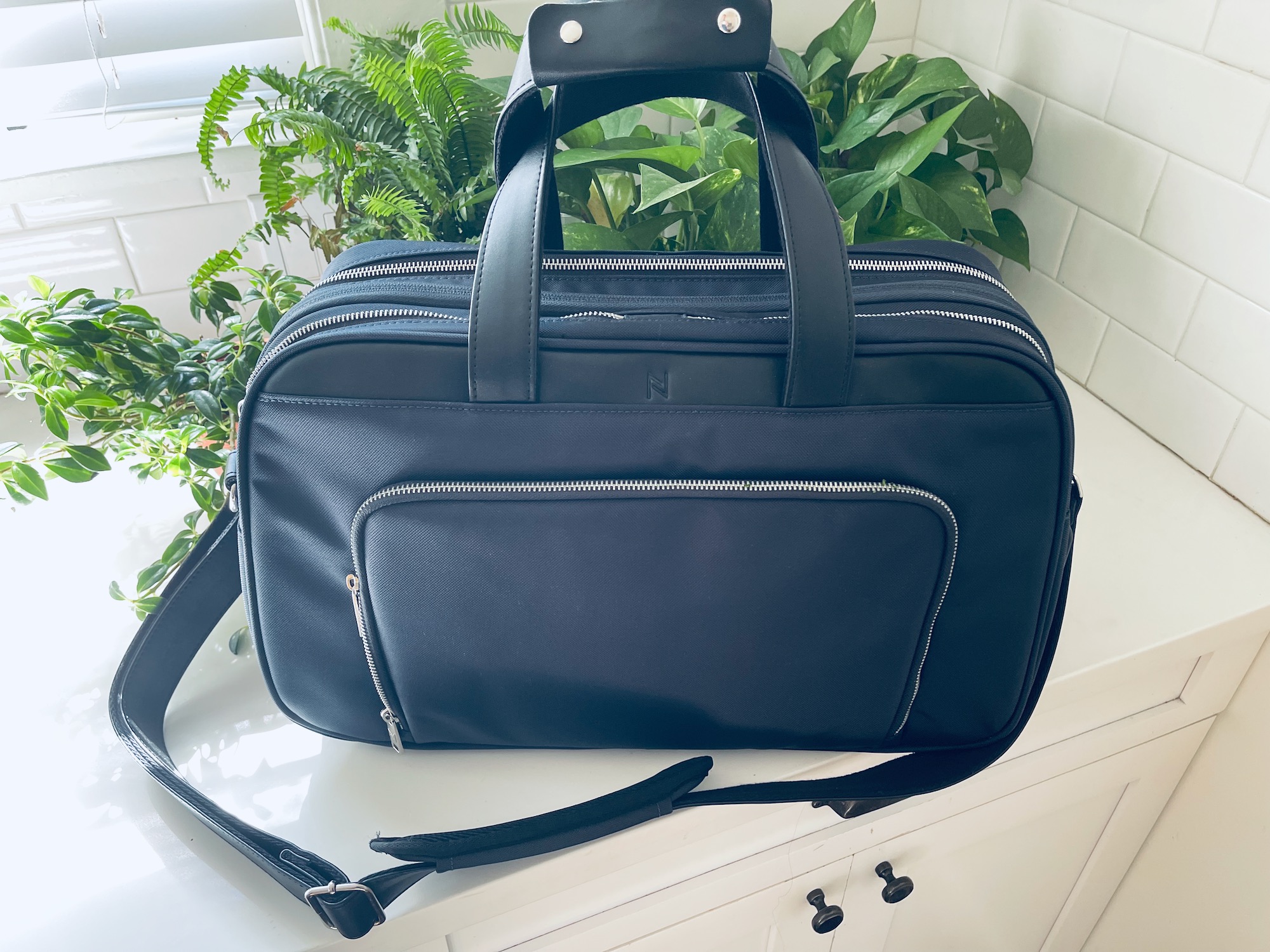 a black bag on a counter