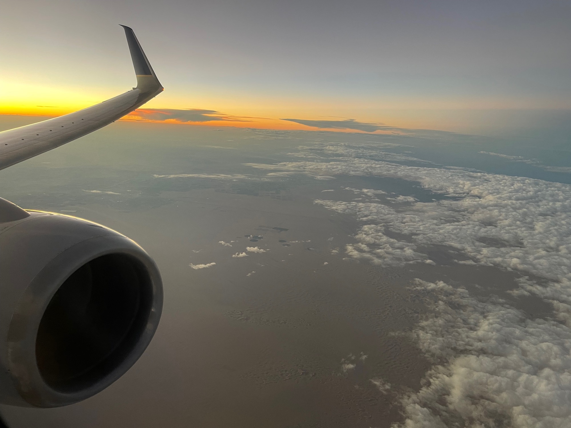 an airplane wing and the sky