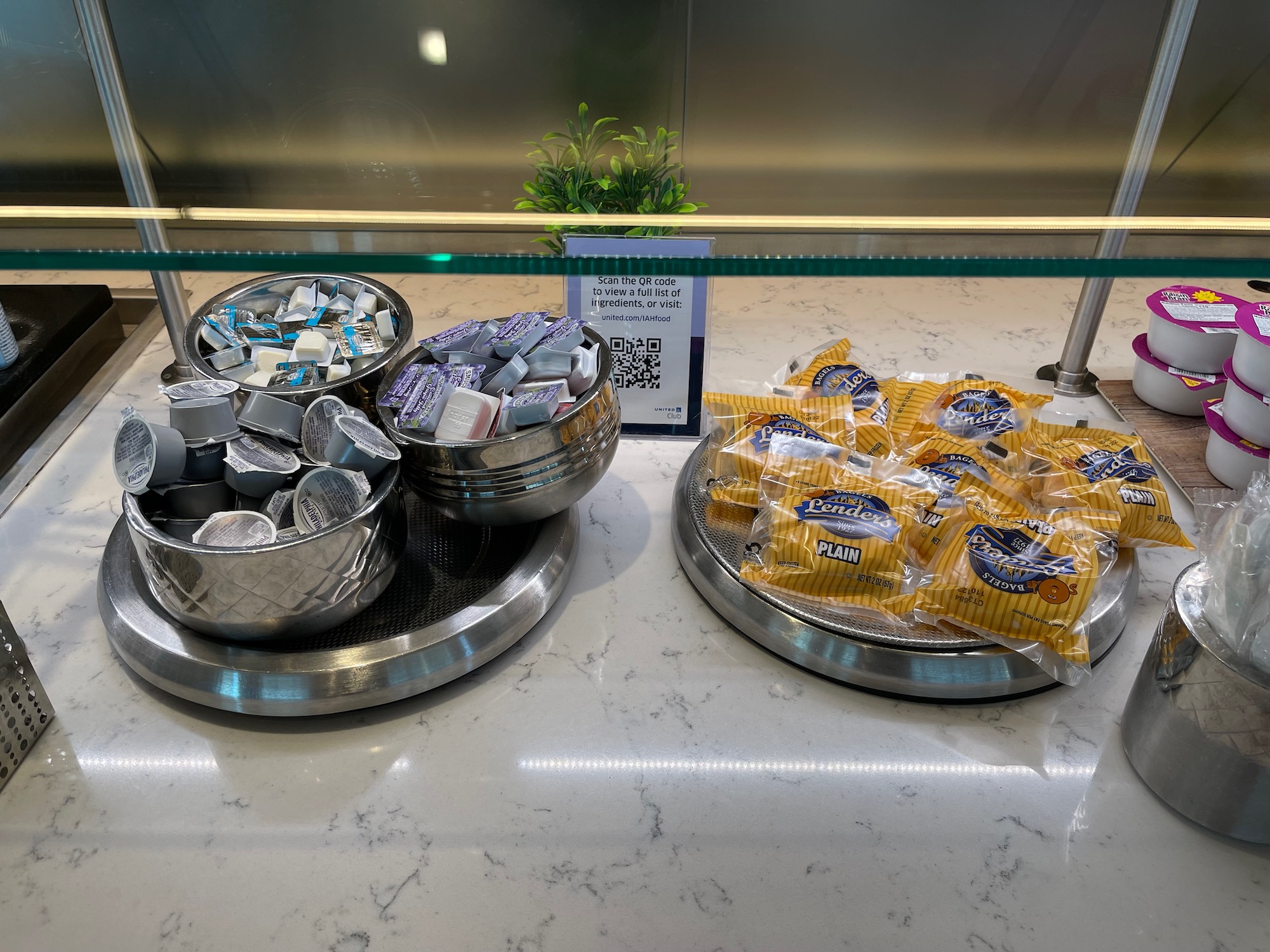 a group of bowls of food on a counter