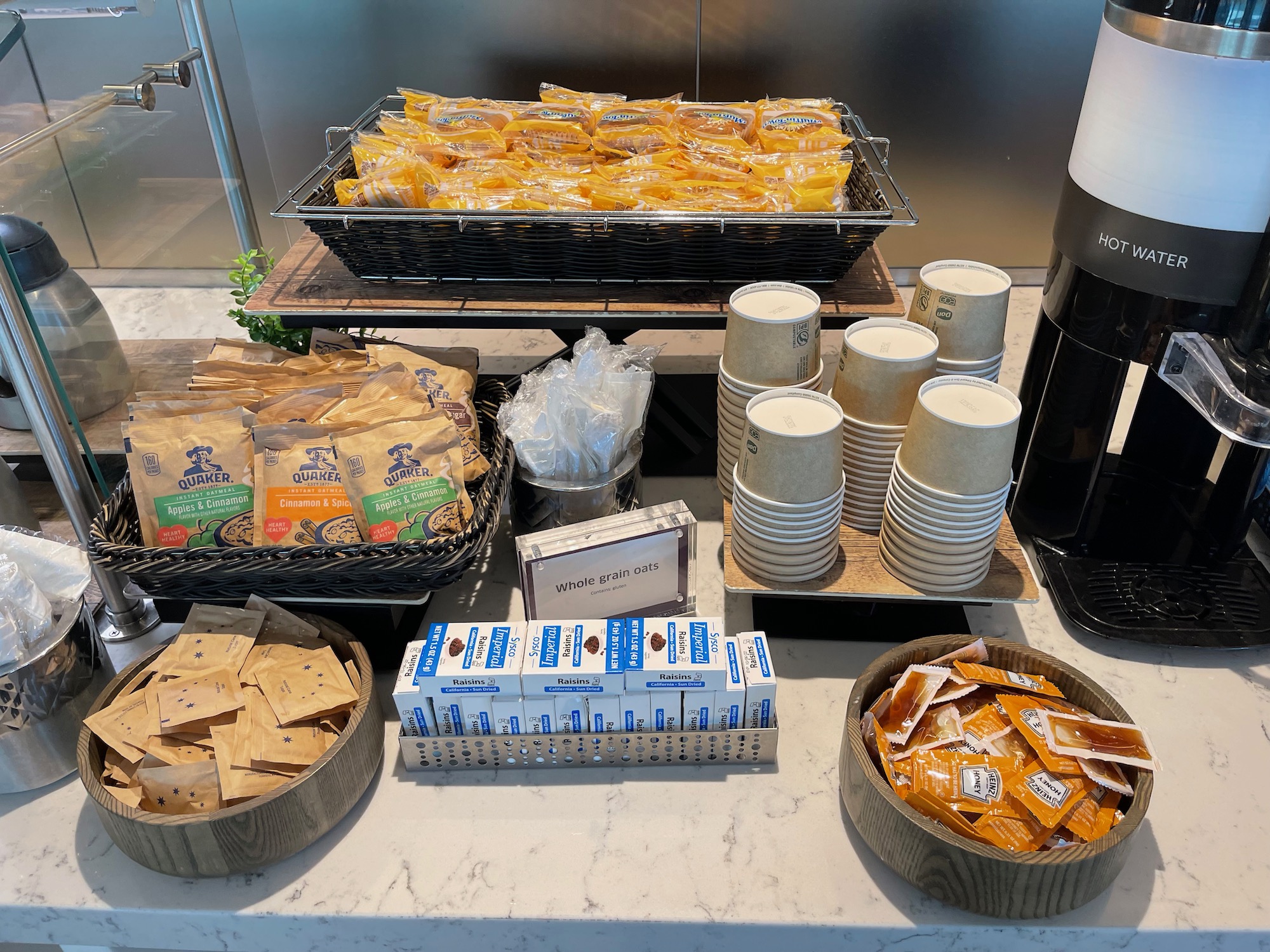 a table with food and coffee machine