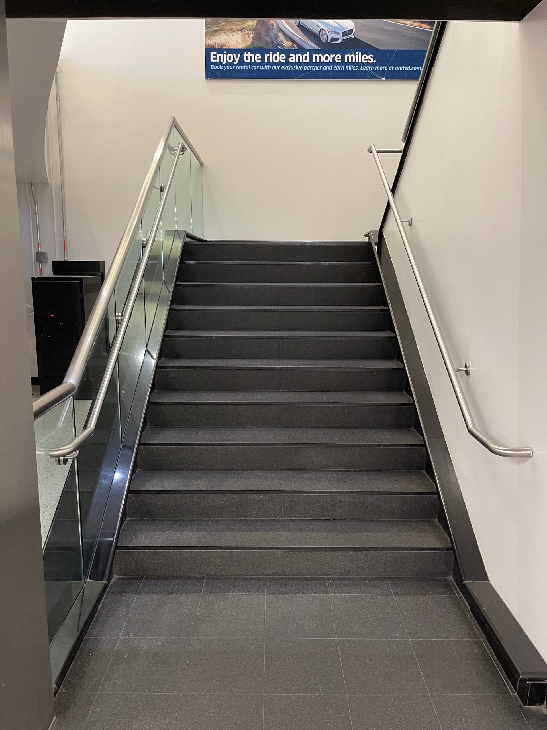 a staircase with metal railings