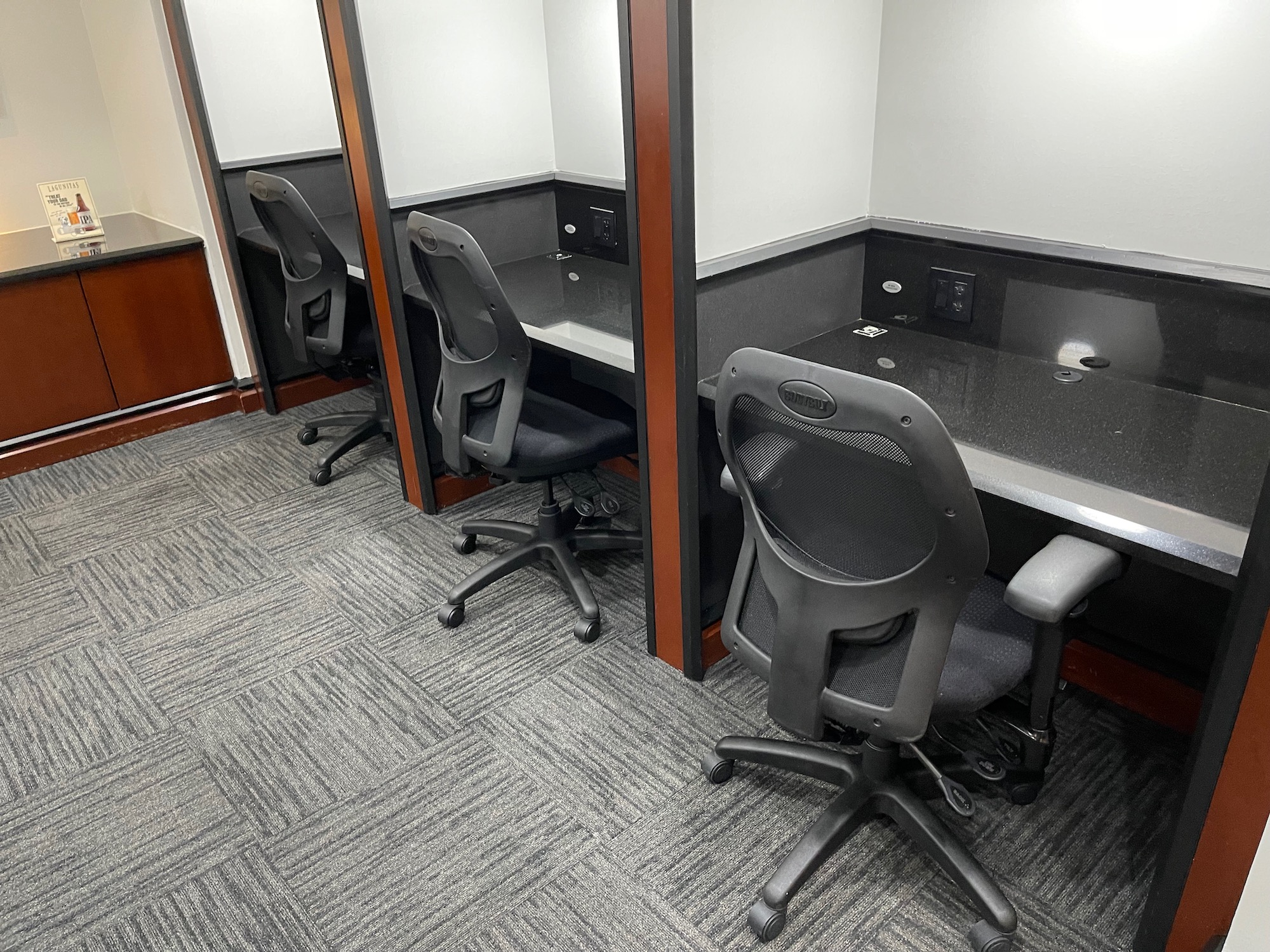 a room with chairs and desks