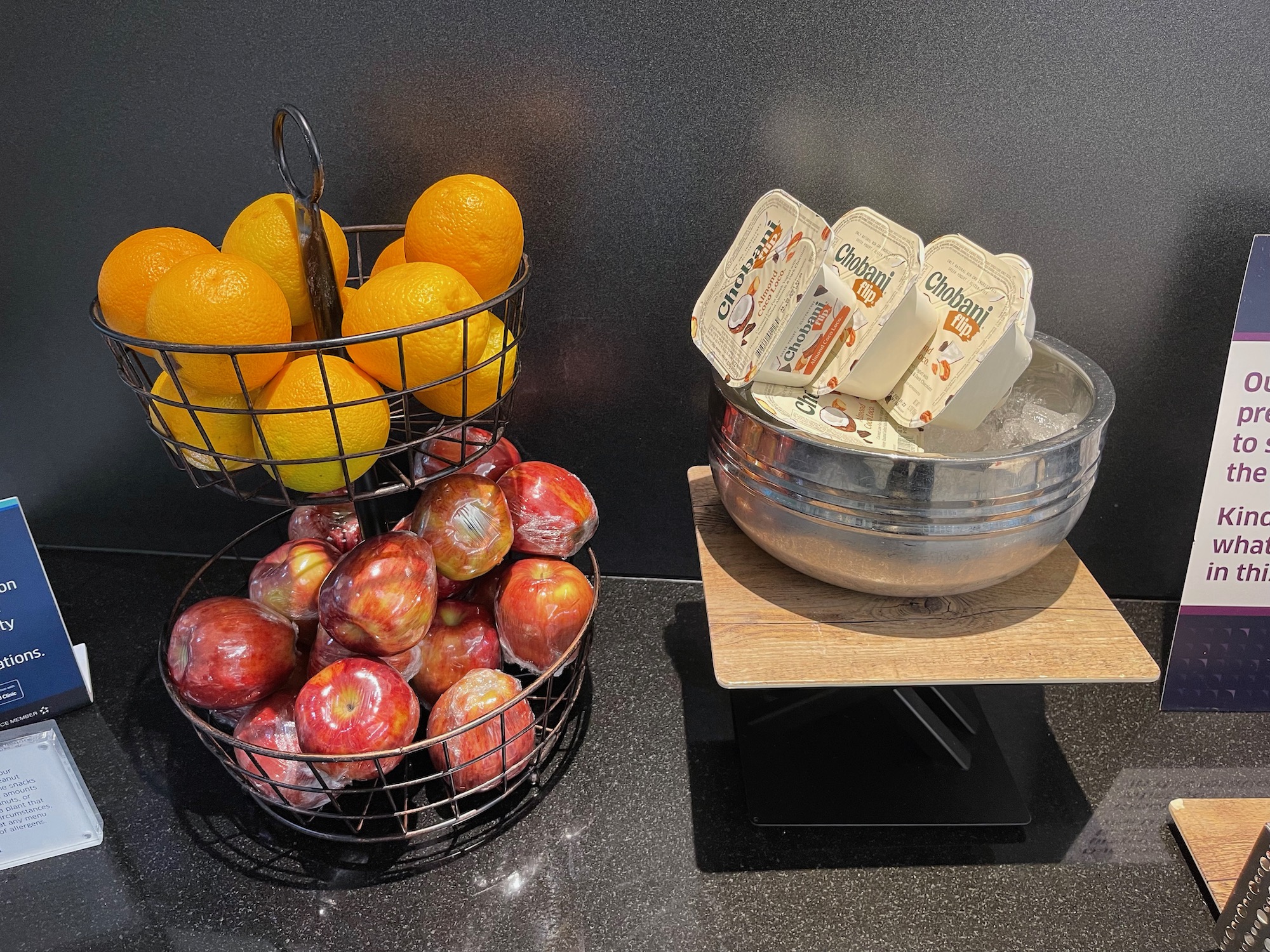 a bowl of oranges and apples