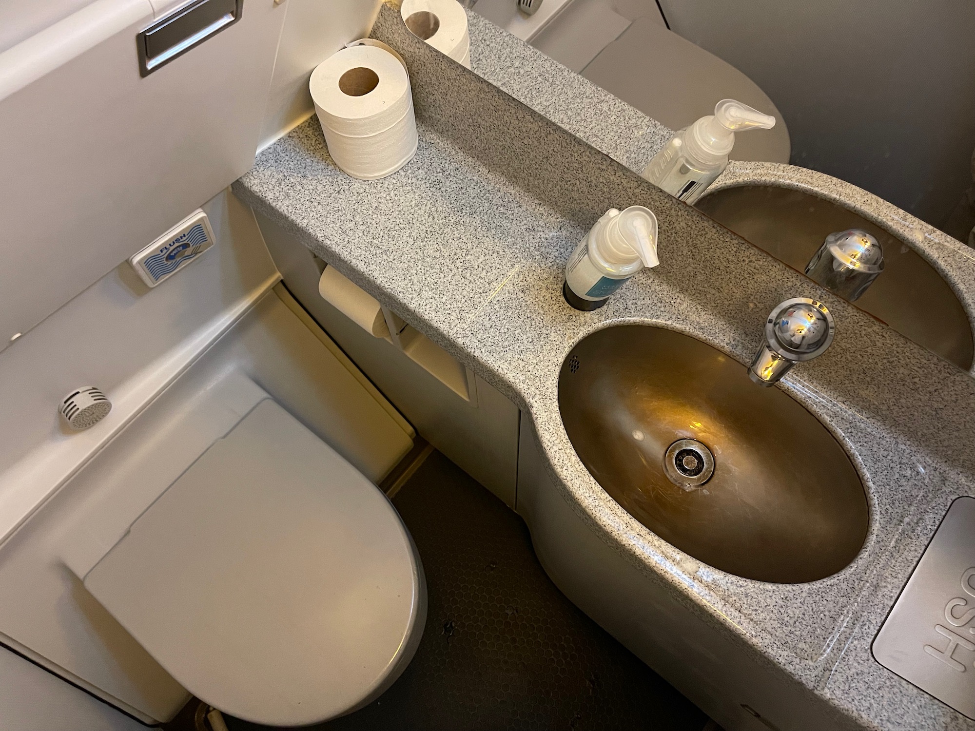 a sink and toilet in a bathroom