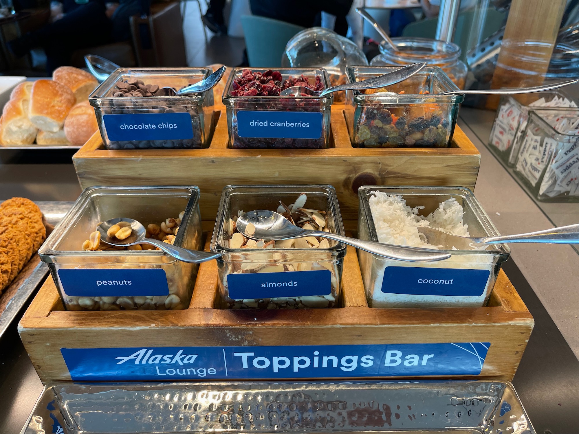 a wooden tray with different kinds of food in it