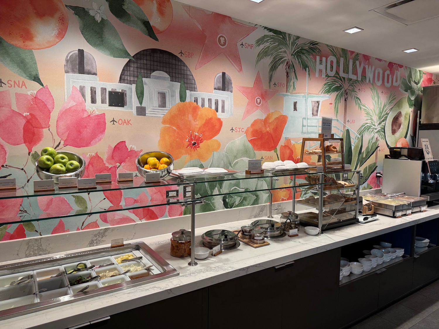 a buffet with fruit on shelves