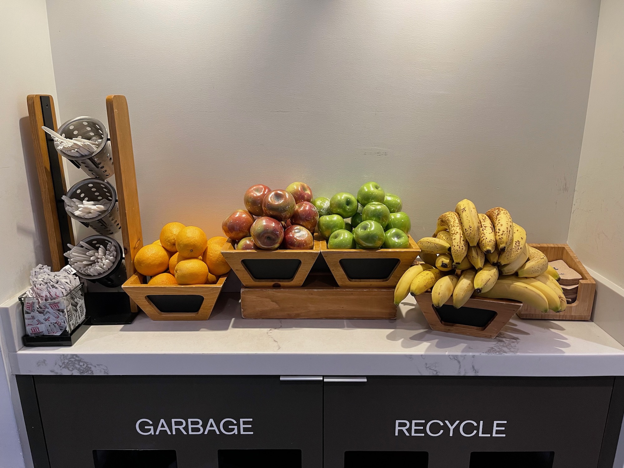 a group of fruit in wooden containers