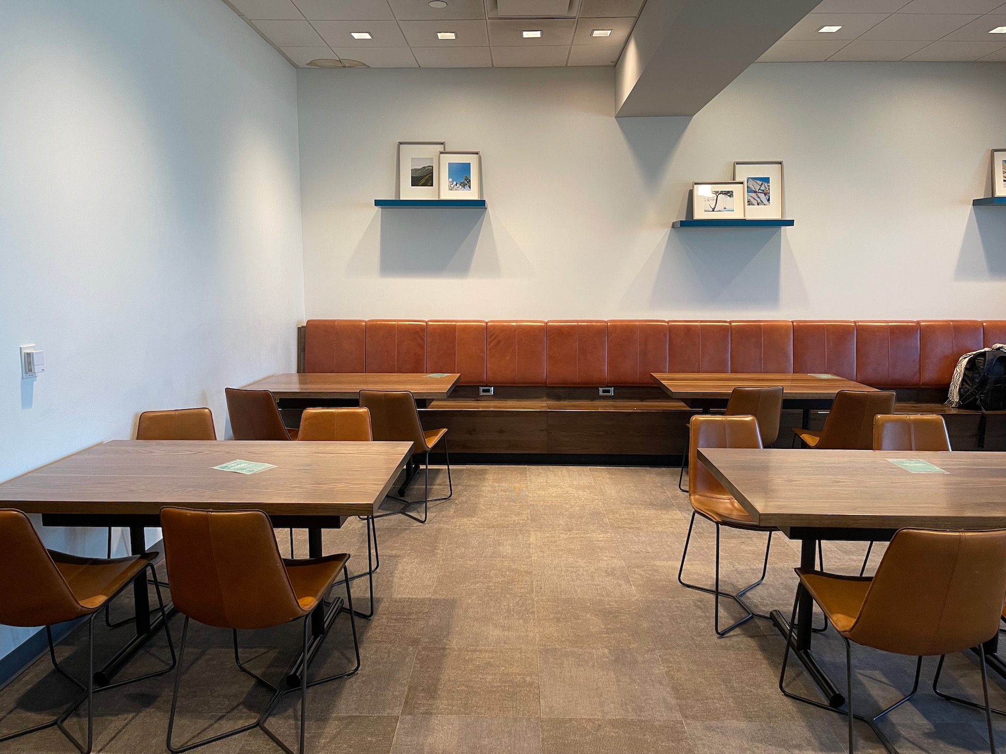 a room with tables and chairs