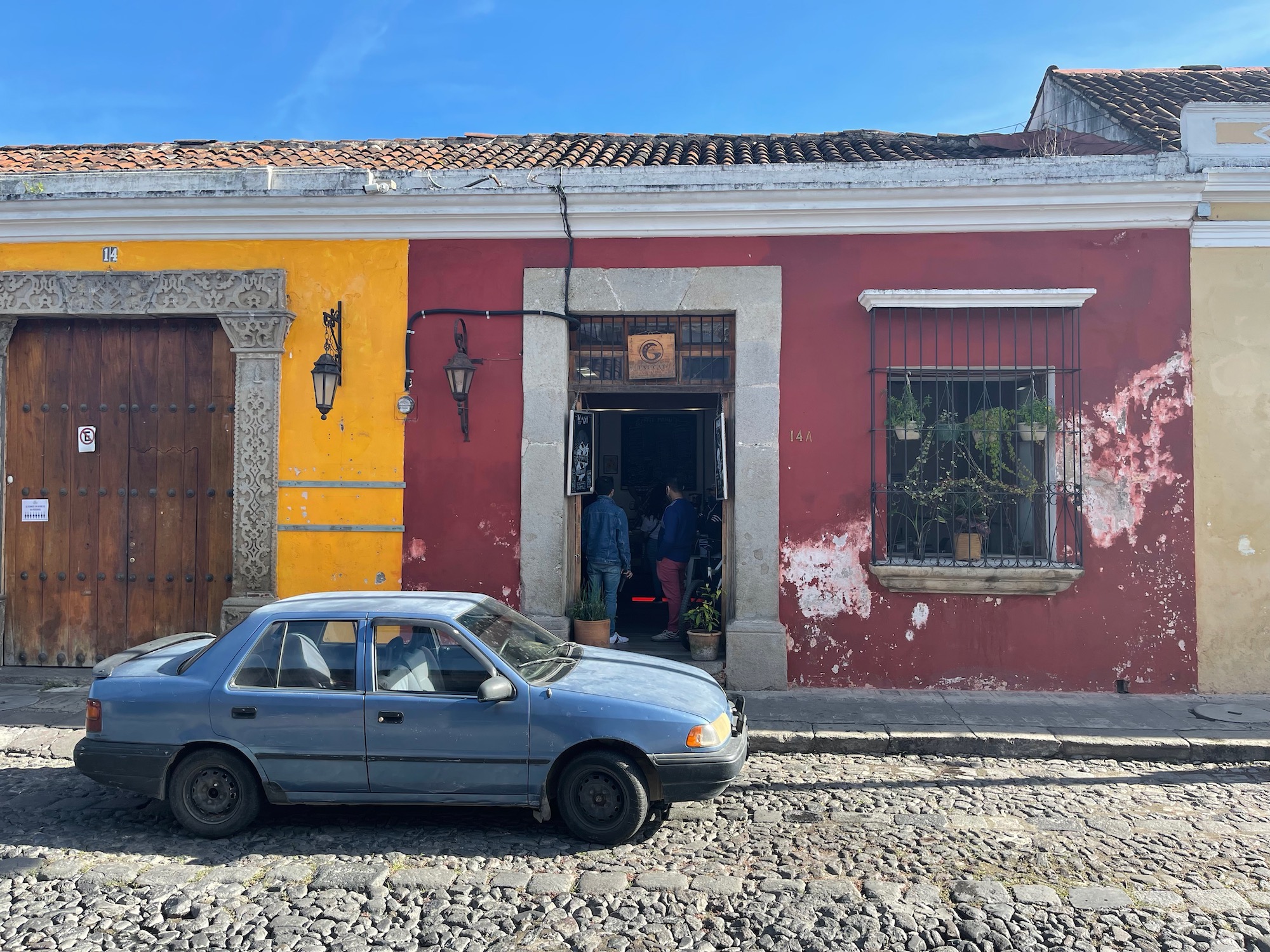 a car parked in front of a building