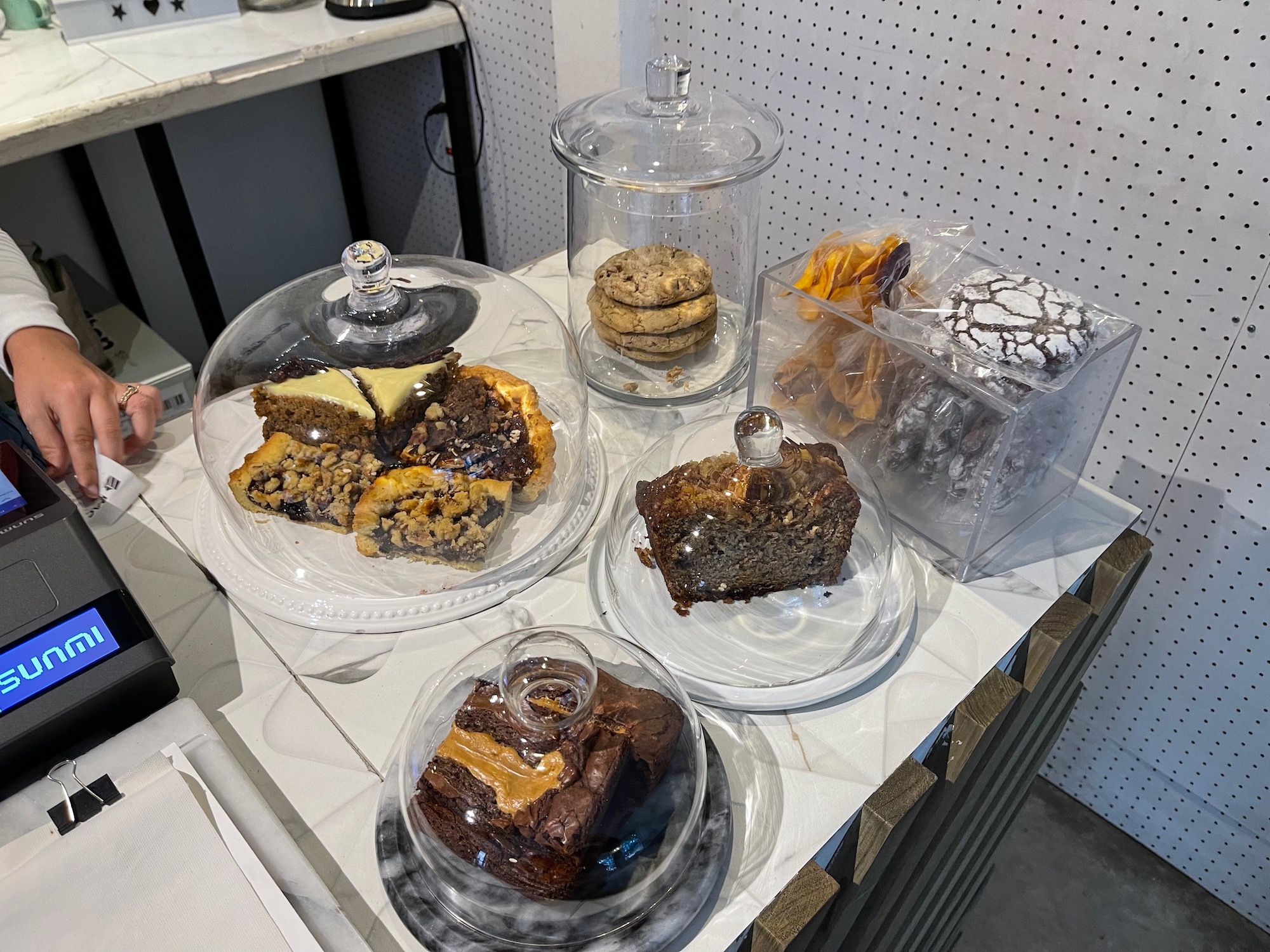 a group of desserts on a counter