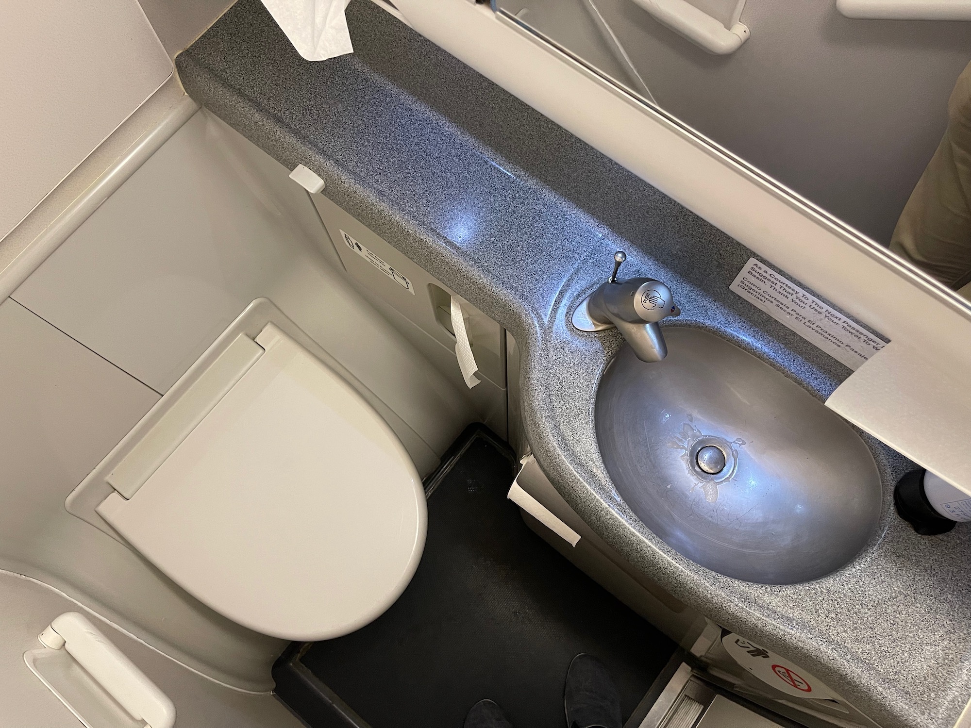 a sink and toilet in a bathroom