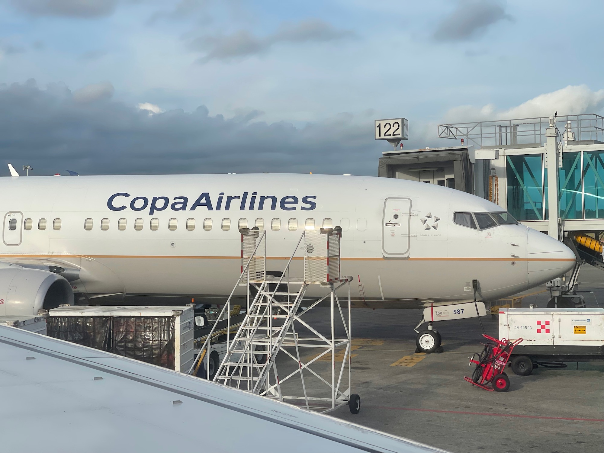 a white airplane at an airport