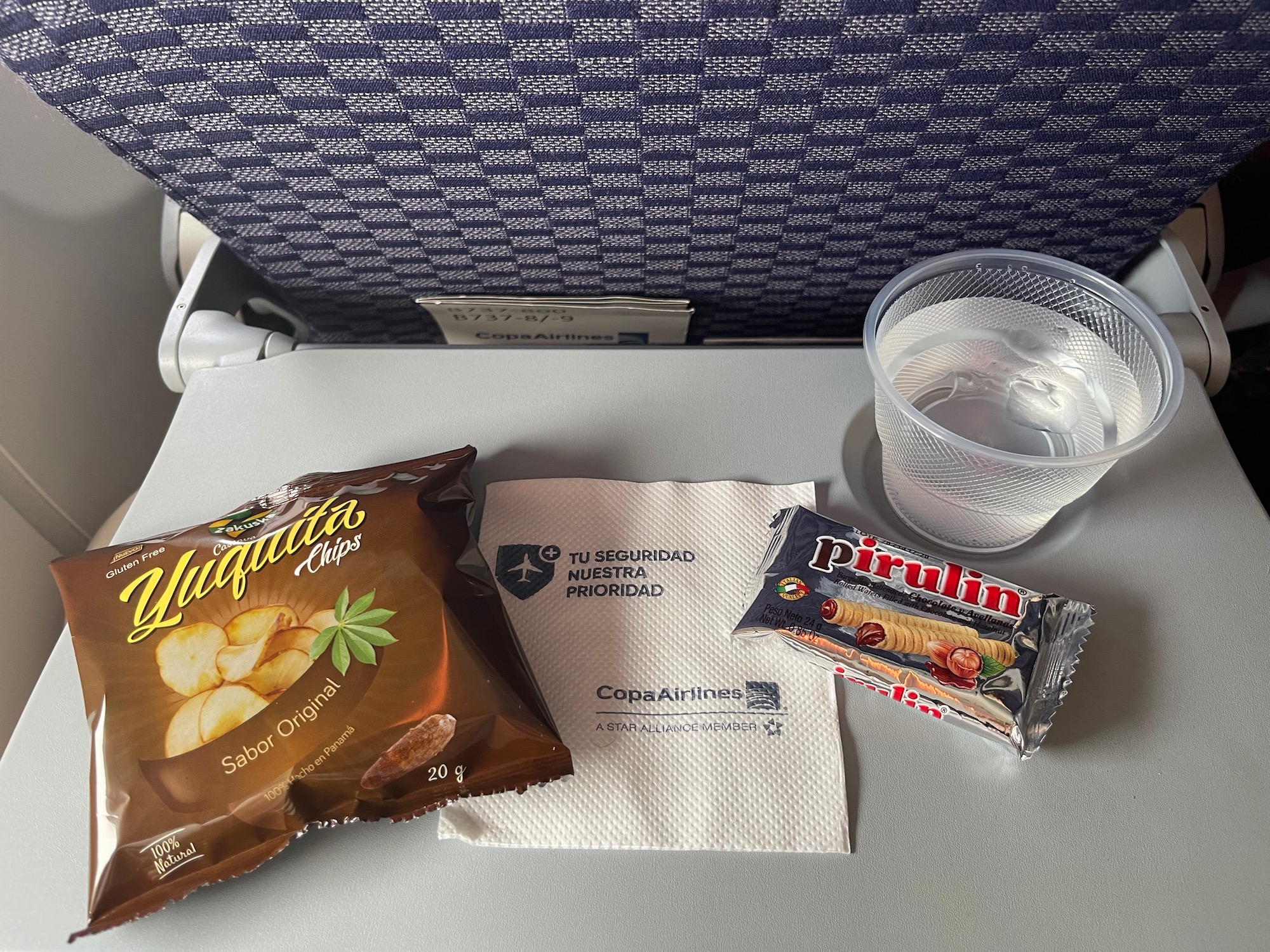 a table with food and a glass of water