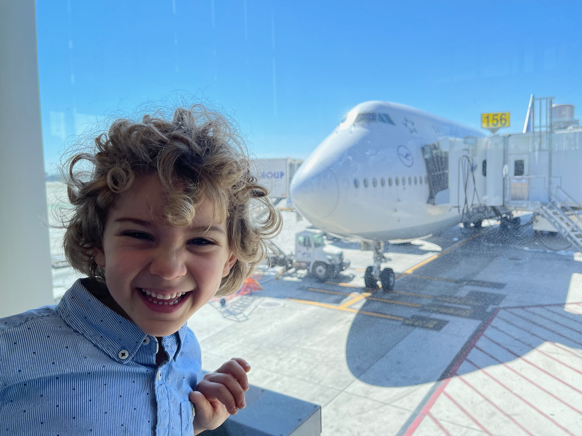 a child smiling at the camera