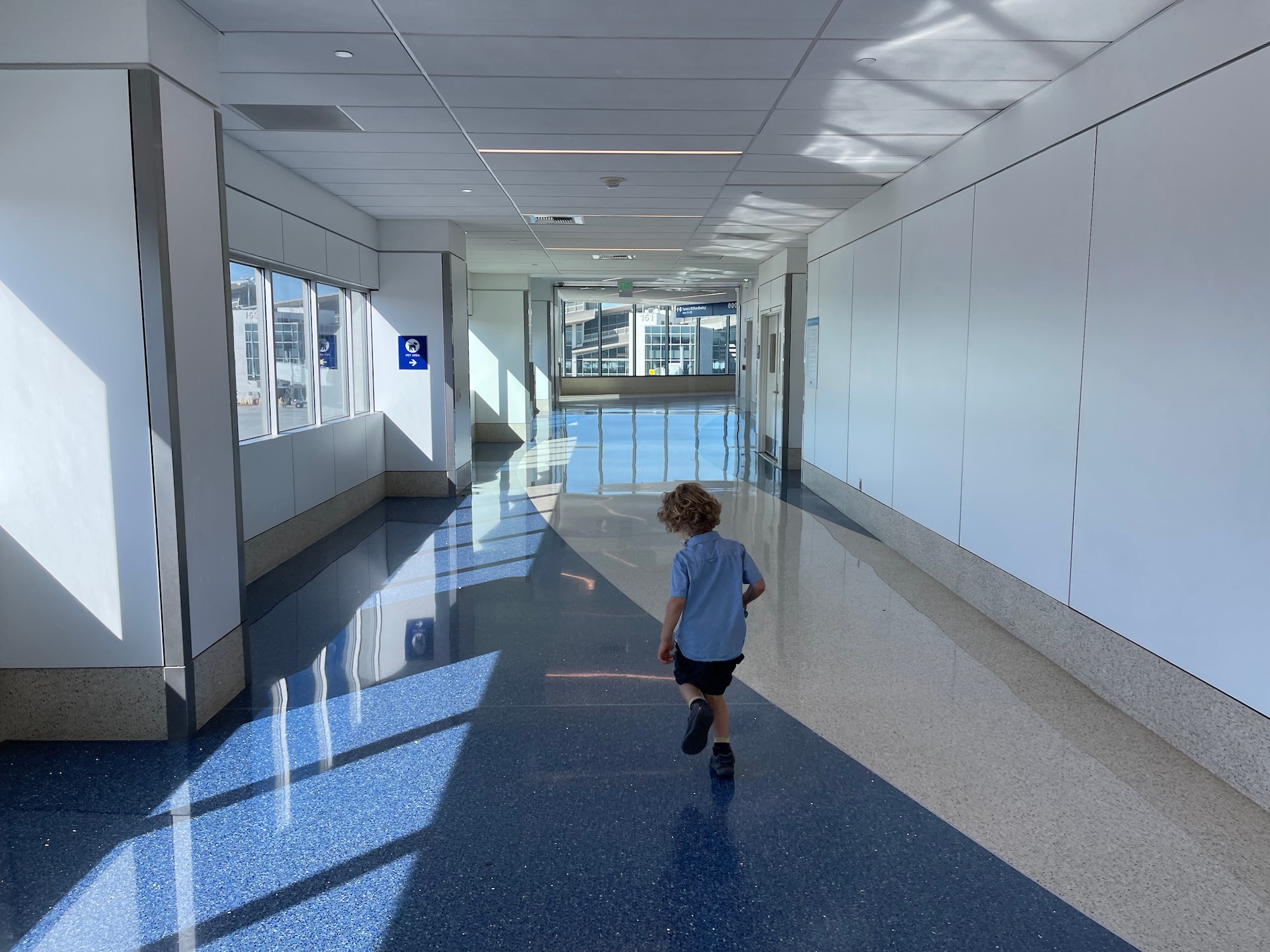 a child running in a hallway