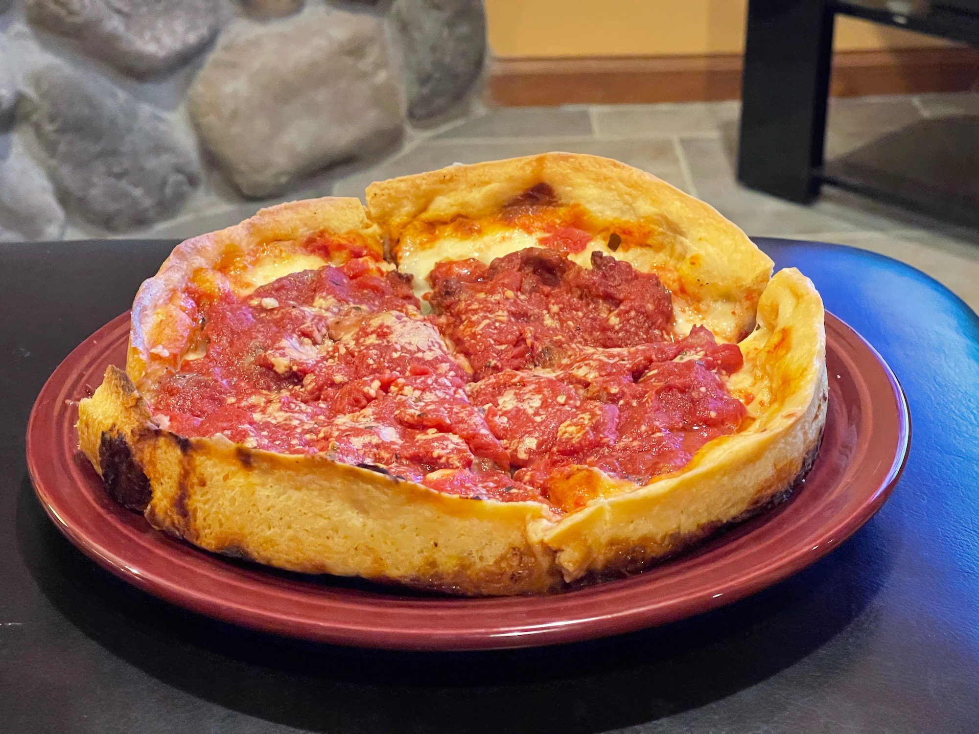 a deep dish pizza on a plate