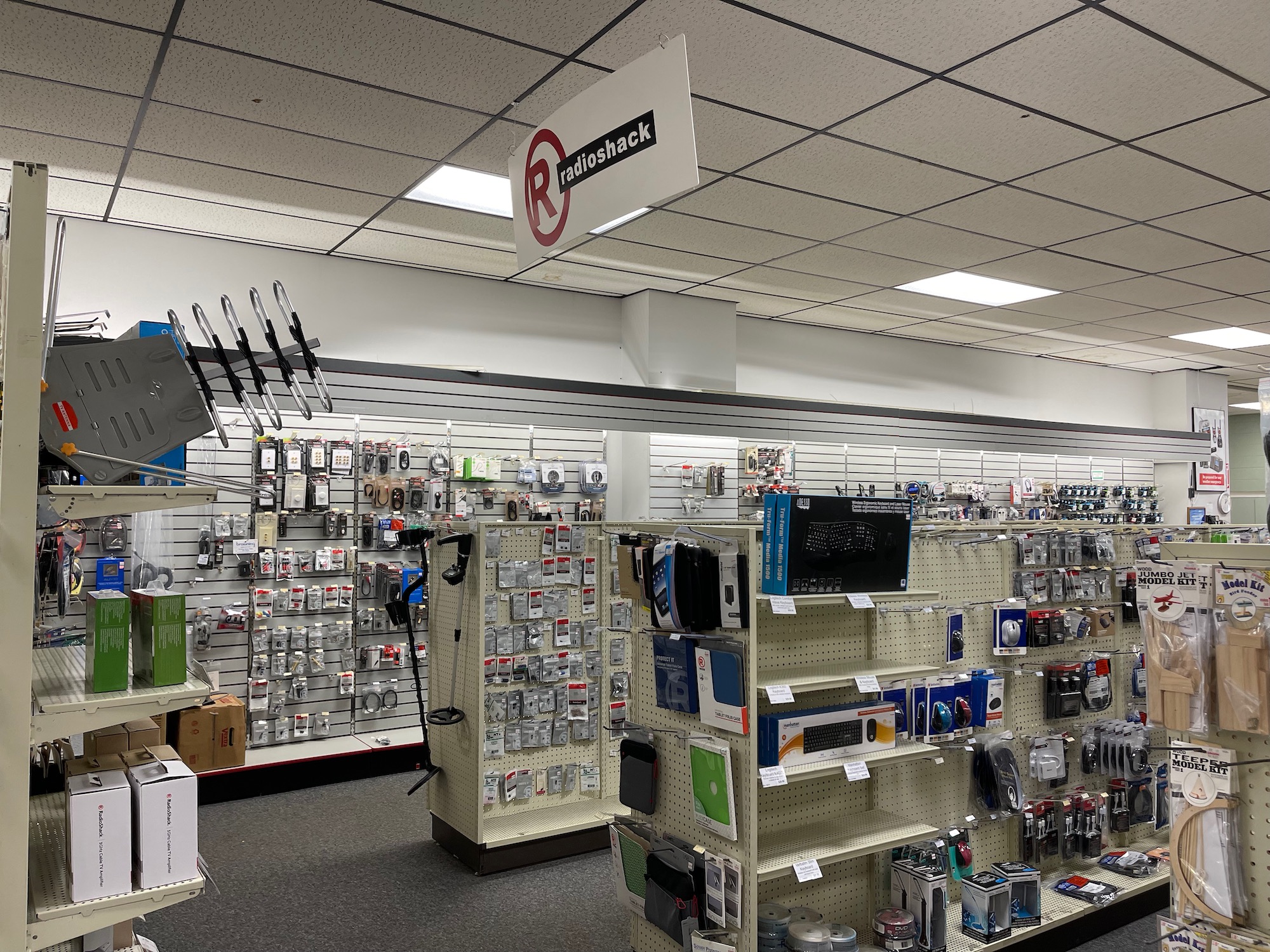 a store with shelves of electronics