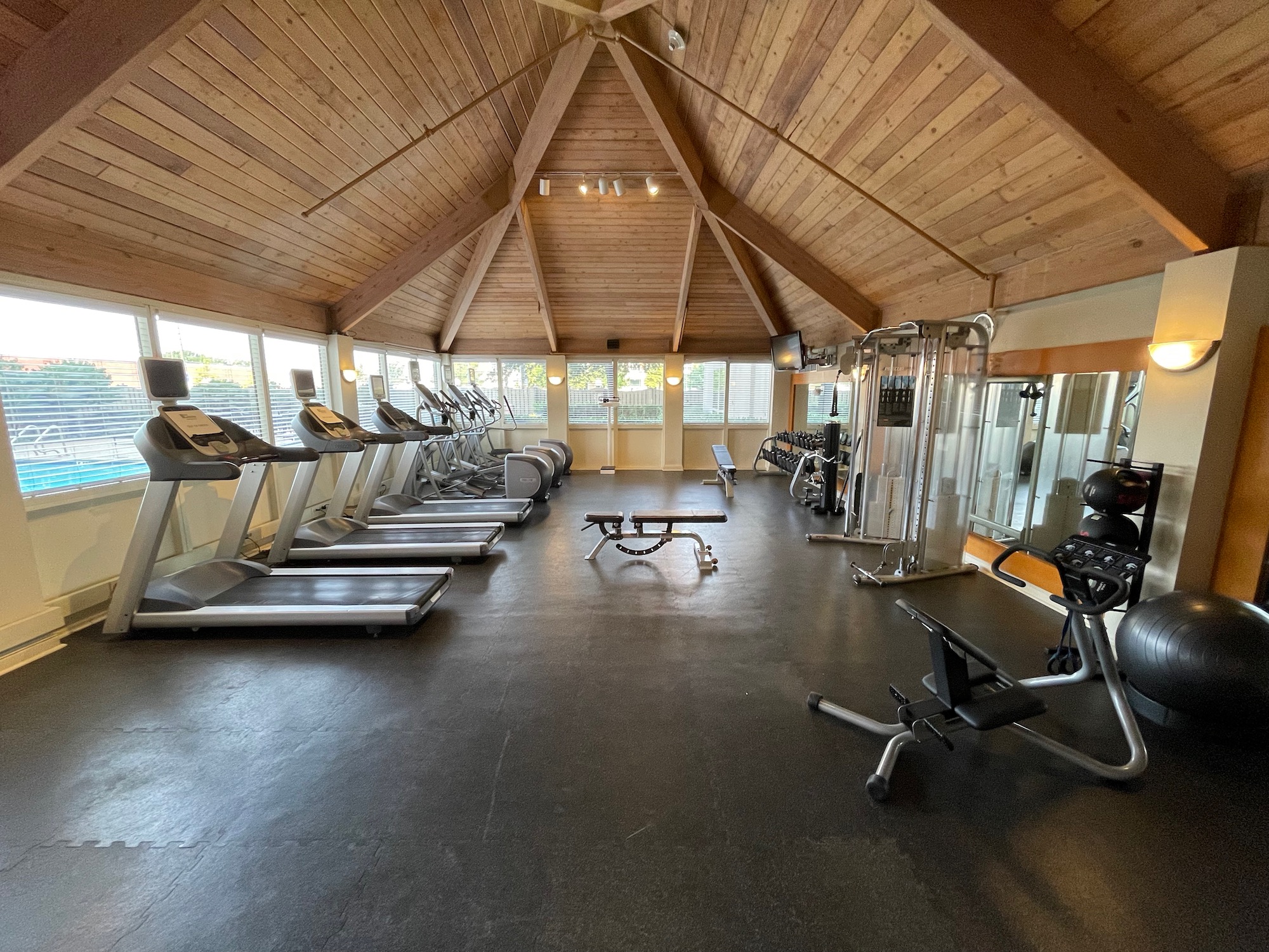 a large gym with treadmills and exercise equipment