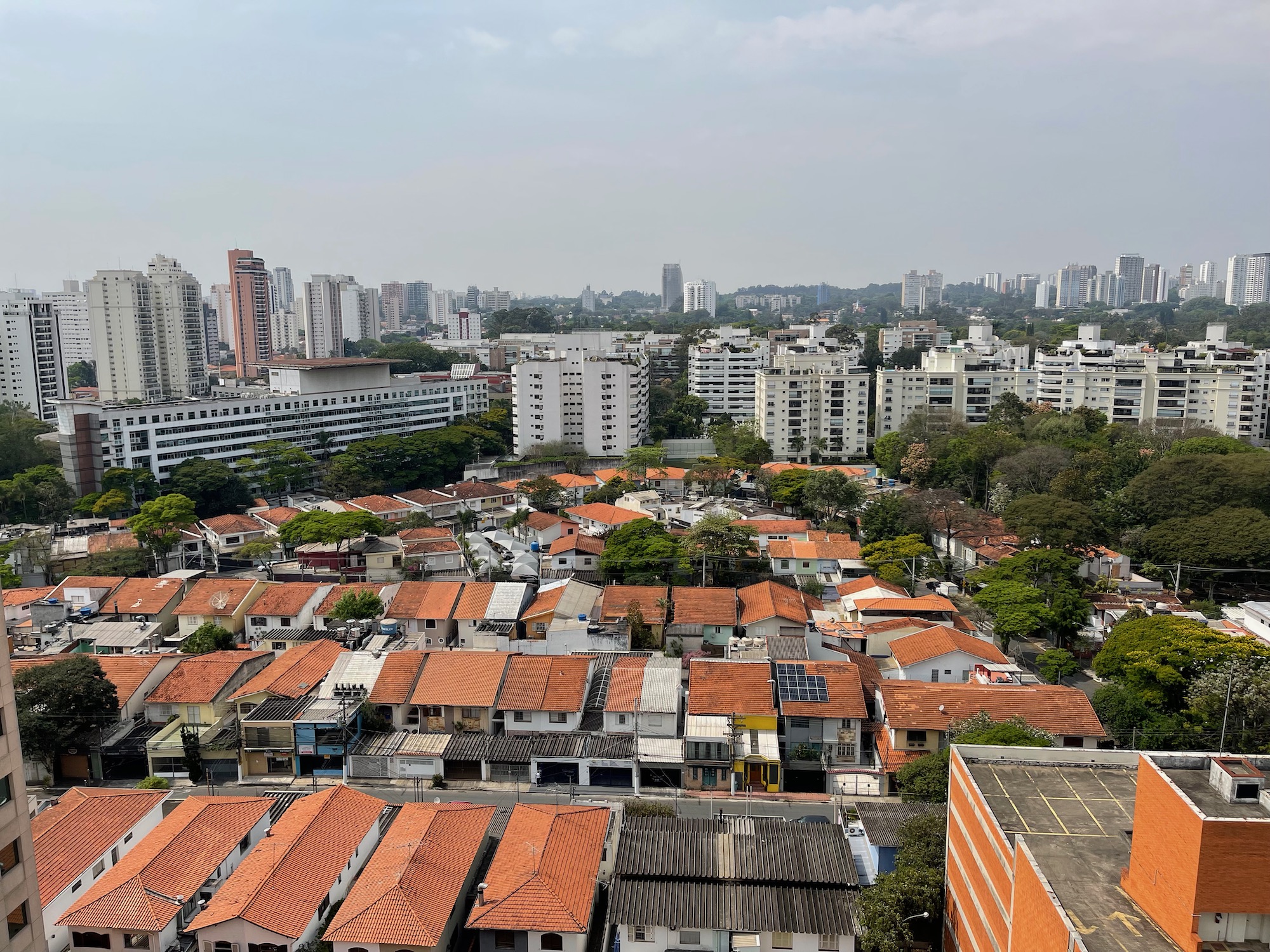 a city with many buildings and trees