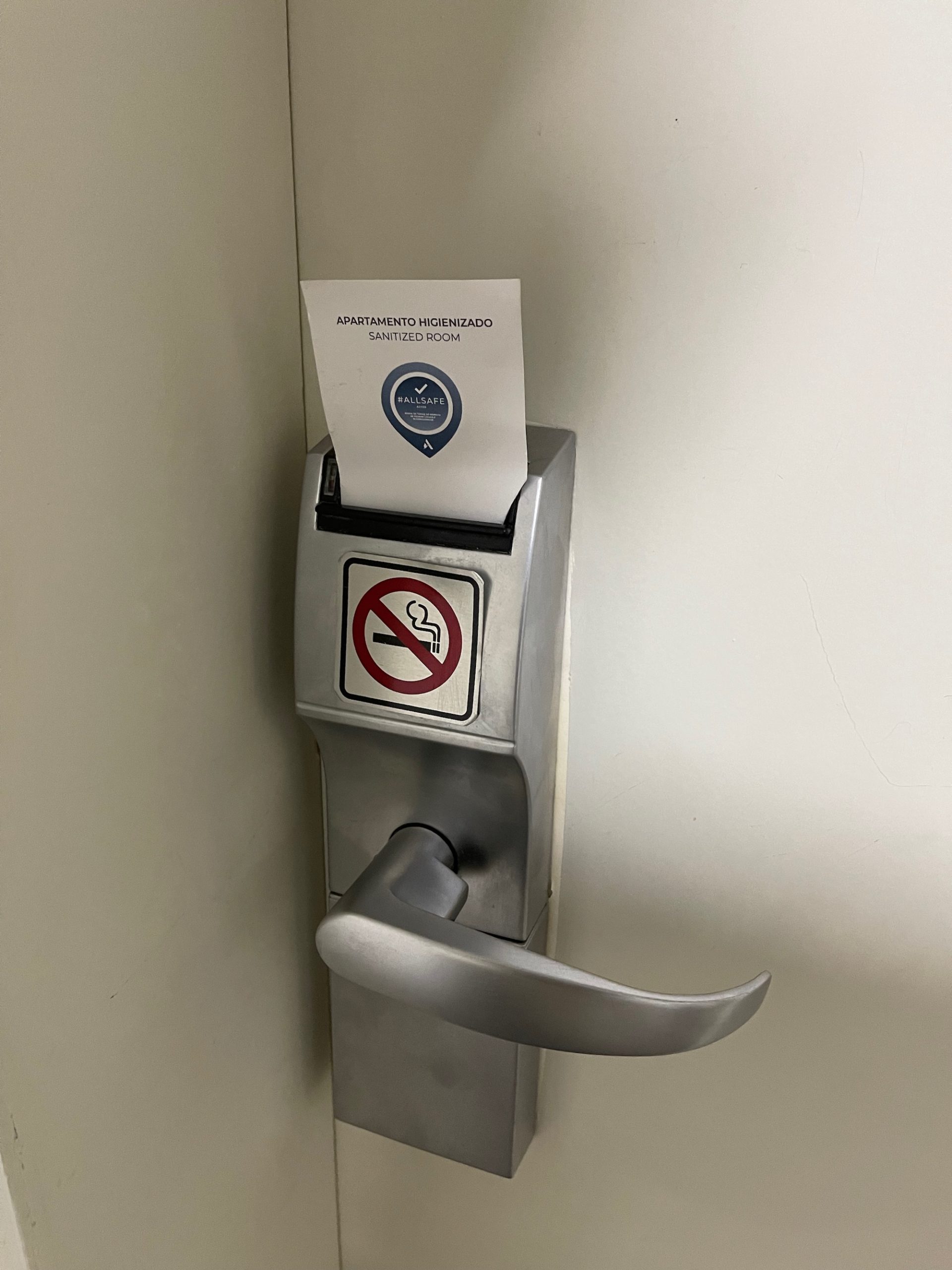 a door handle with a paper in it