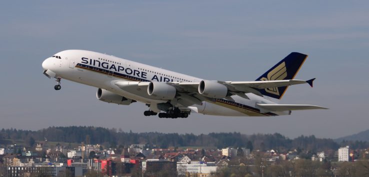 a large airplane flying in the sky