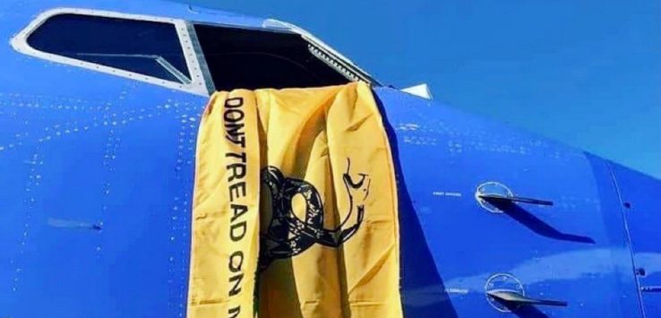 a yellow flag on a blue plane