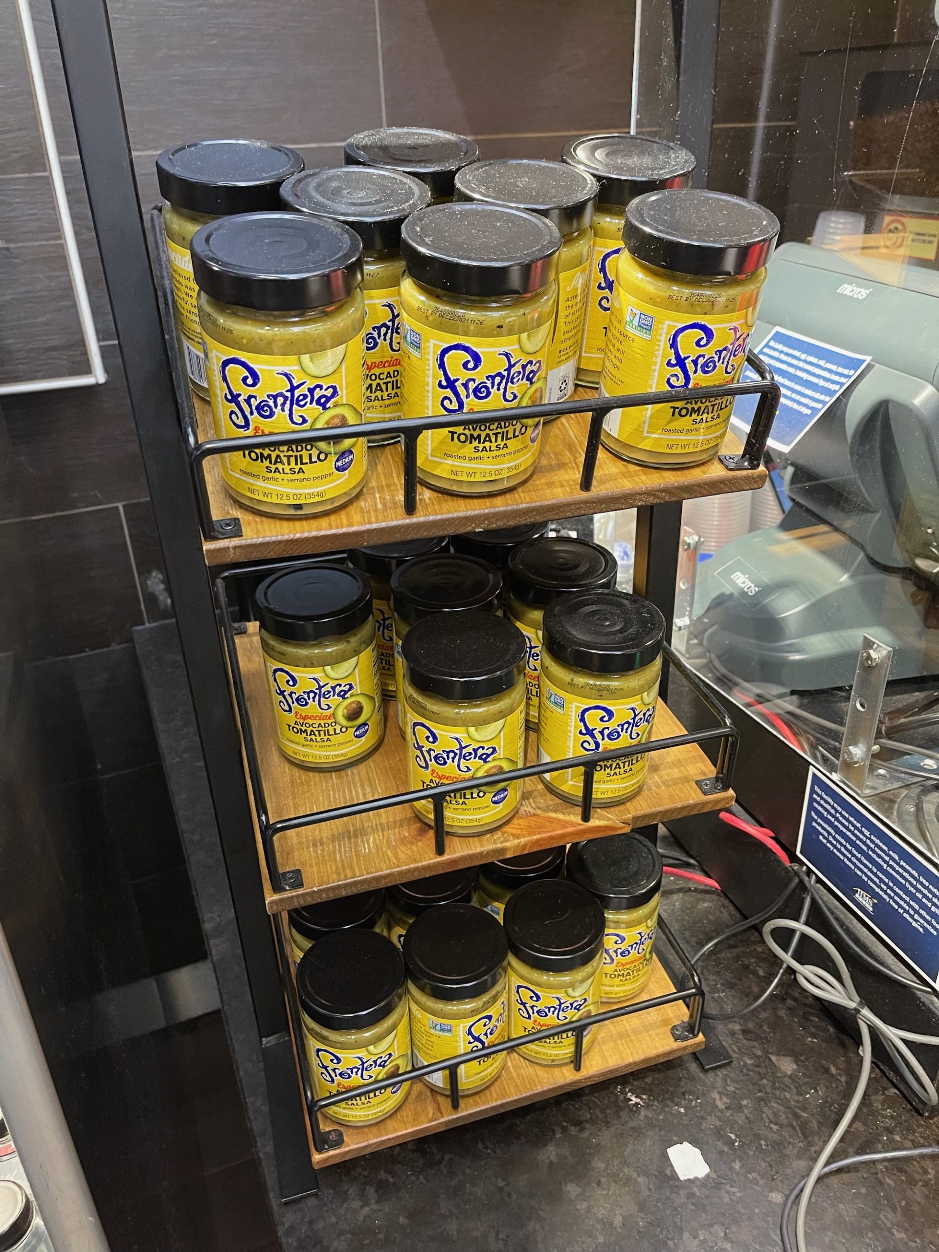 a shelf with jars of food on it