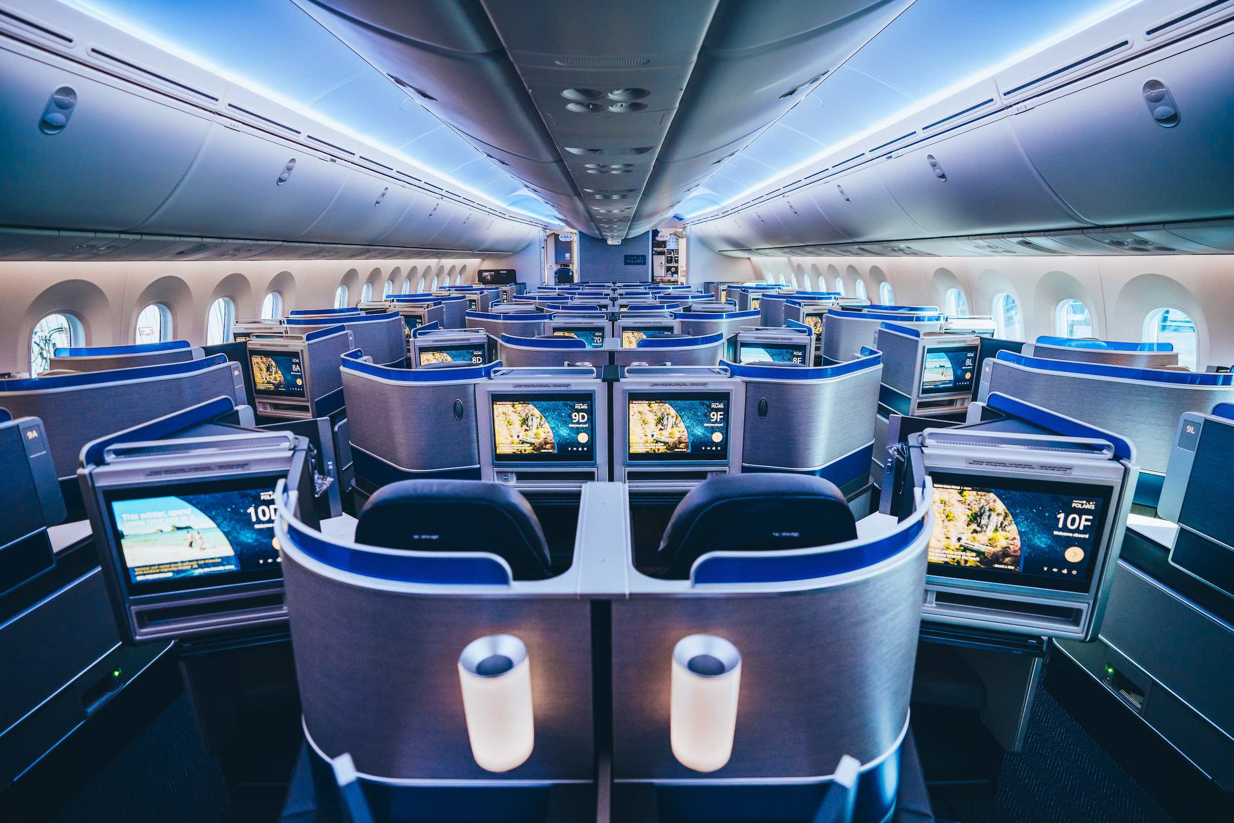 an airplane with rows of monitors