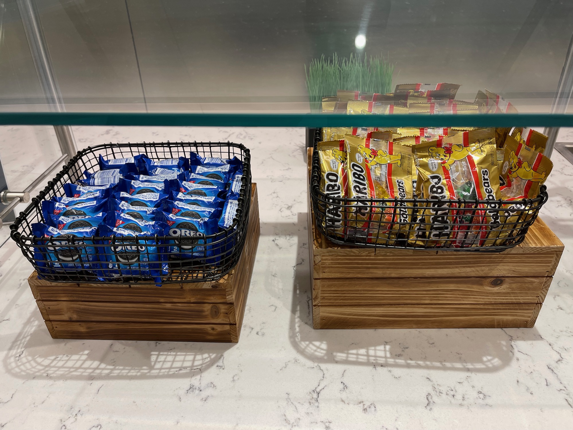 a couple of wooden crates with candy in them