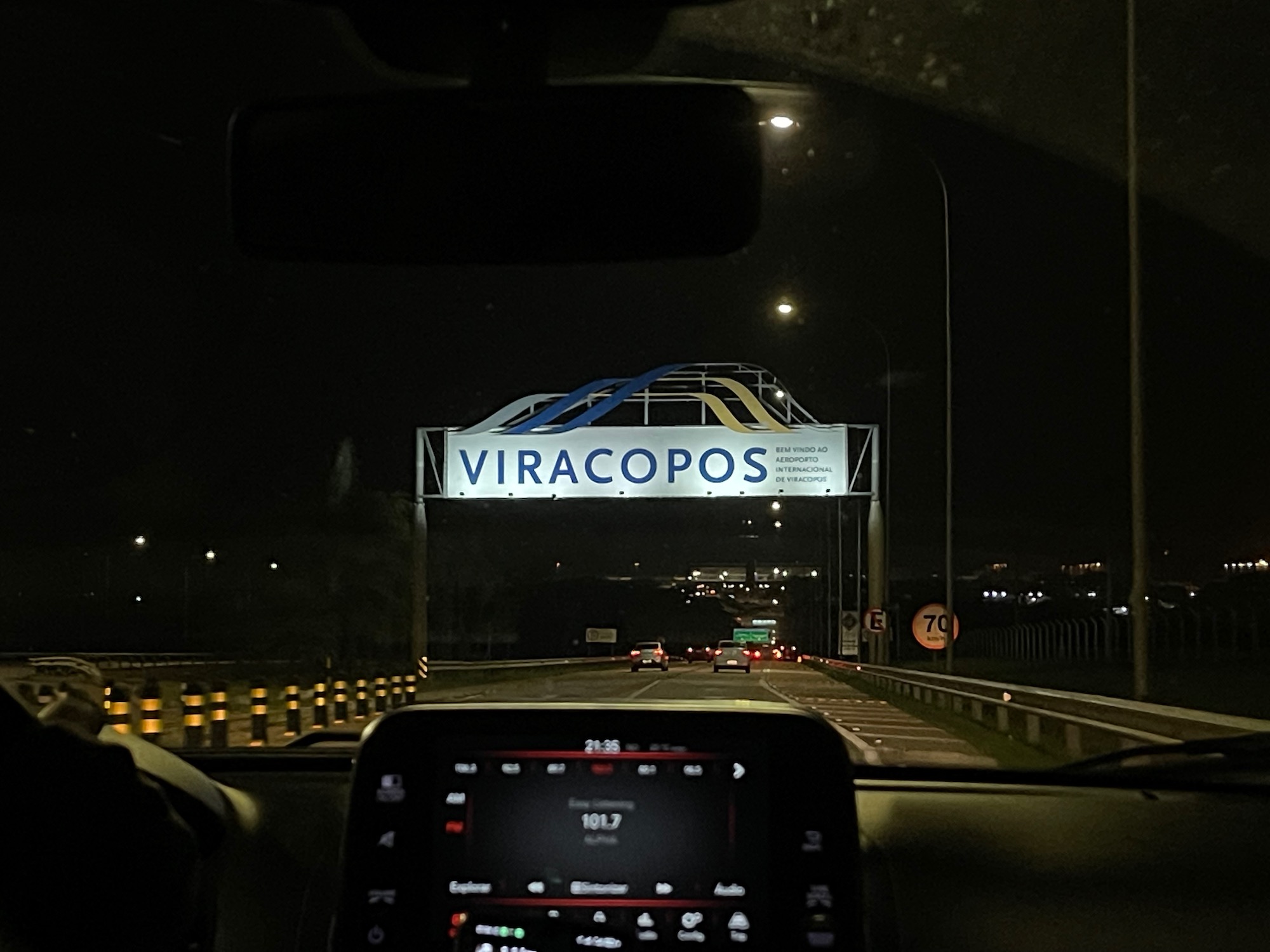 a view from inside of a car at night