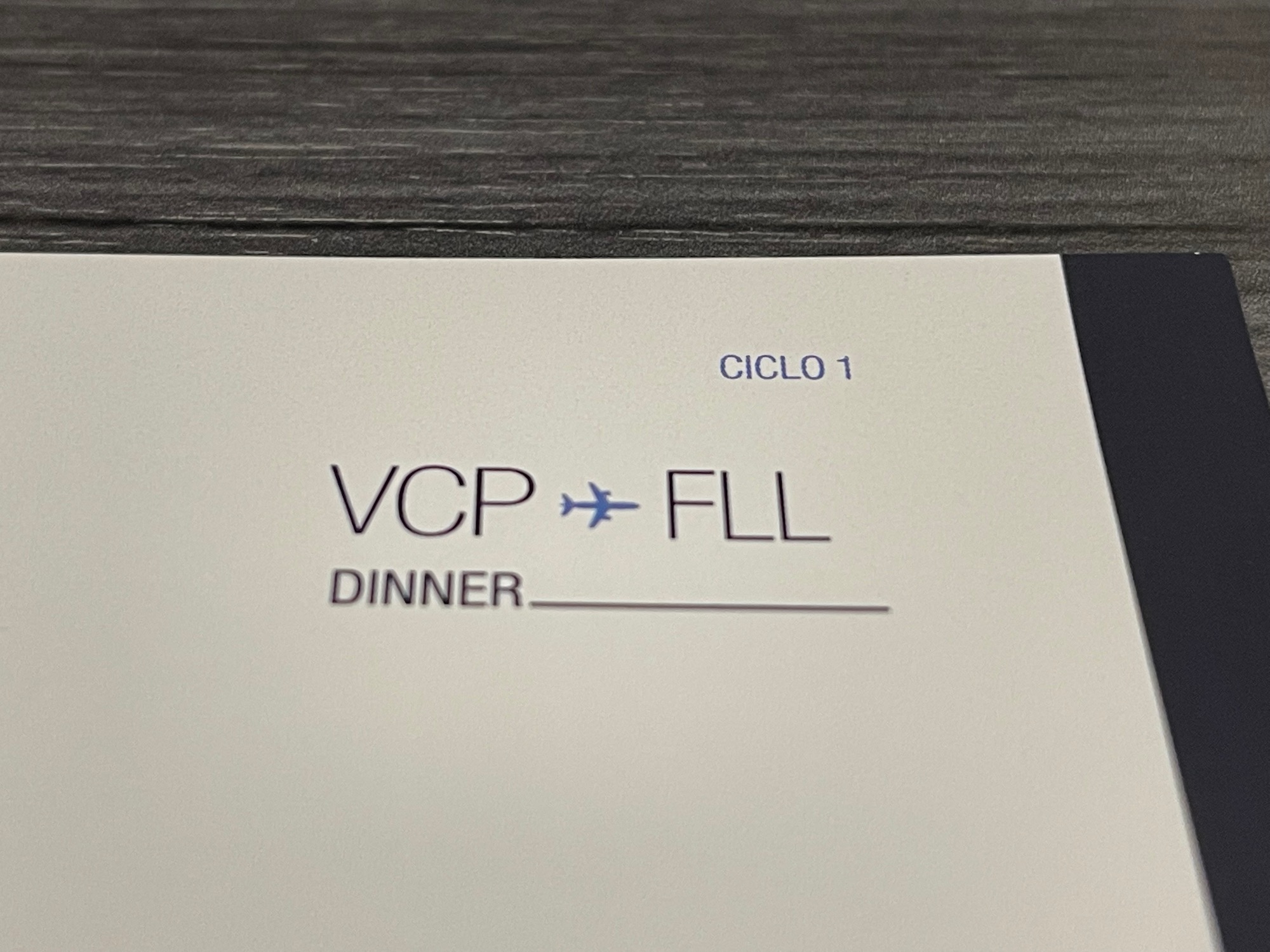 a white paper with black text and blue text on it