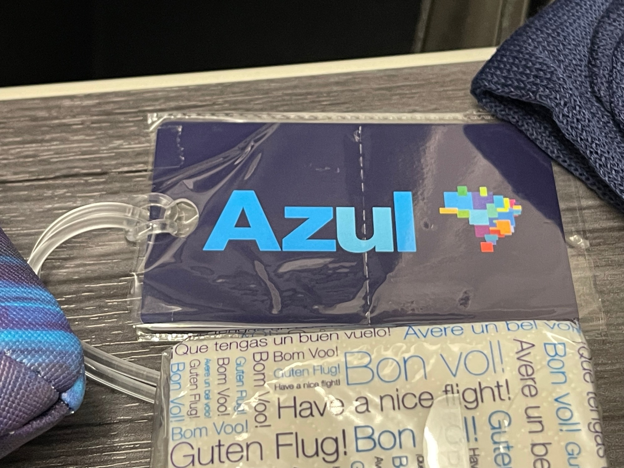 a blue tag with blue text on it